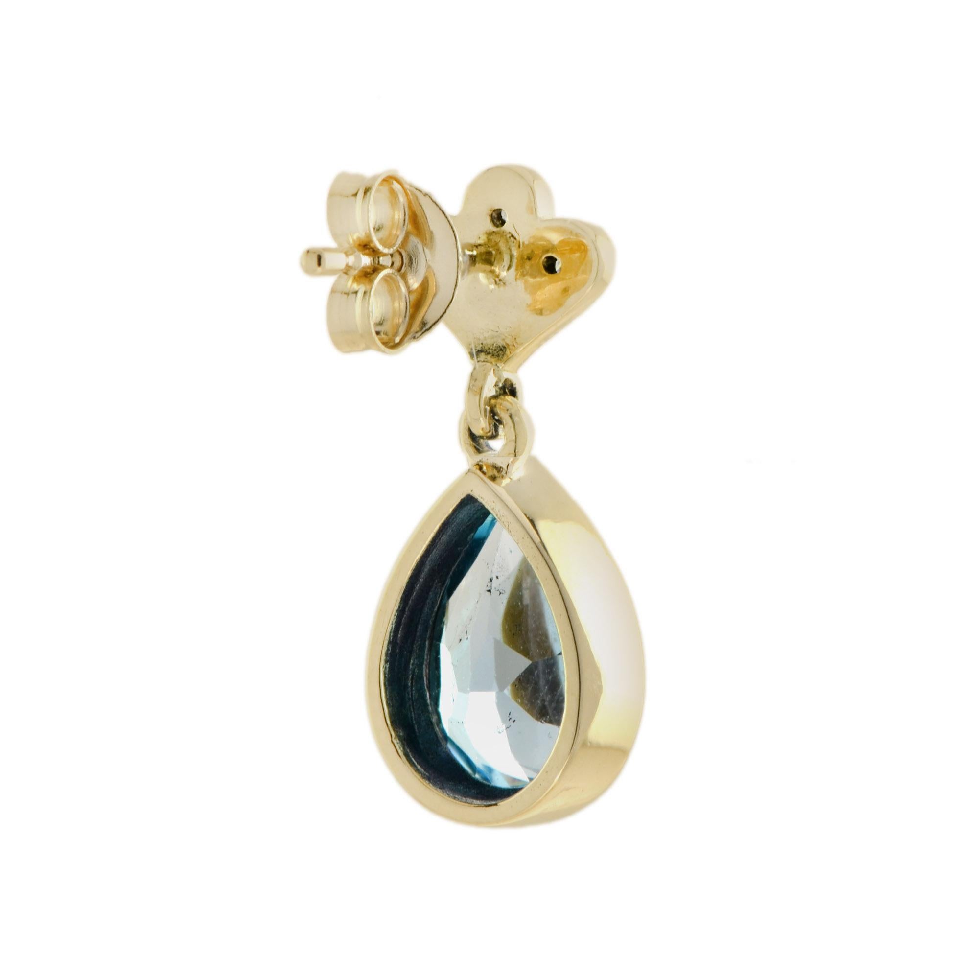 Pear Cut Vintage Style Blue Topaz and Diamond Drop Earrings in 9k Yellow Gold For Sale