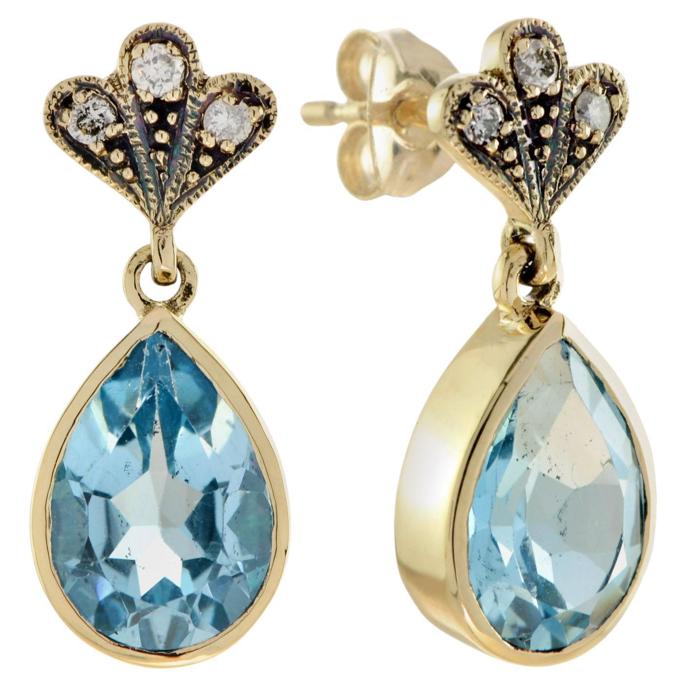 Vintage Style Blue Topaz and Diamond Drop Earrings in 9k Yellow Gold For Sale