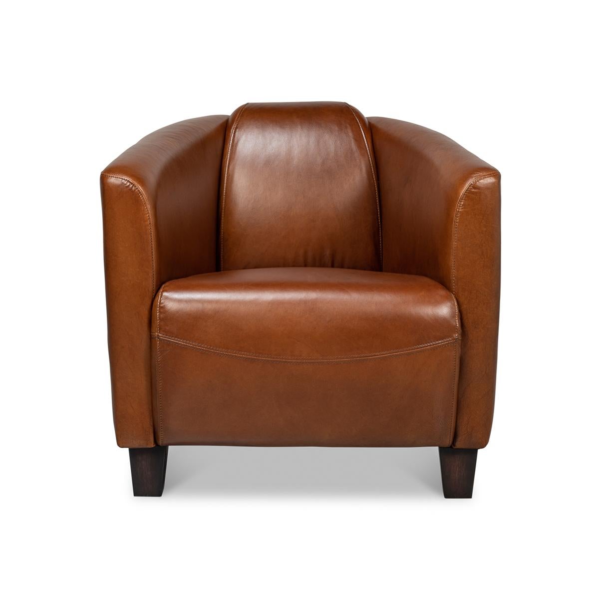 Vintage-style brown leather club chair. Crafted of luxurious top grain leather in warm brown color, this stylish and comfortable chair is perfect for your den, library, or living room.

Color variation is common and acceptable on vintage leather.
