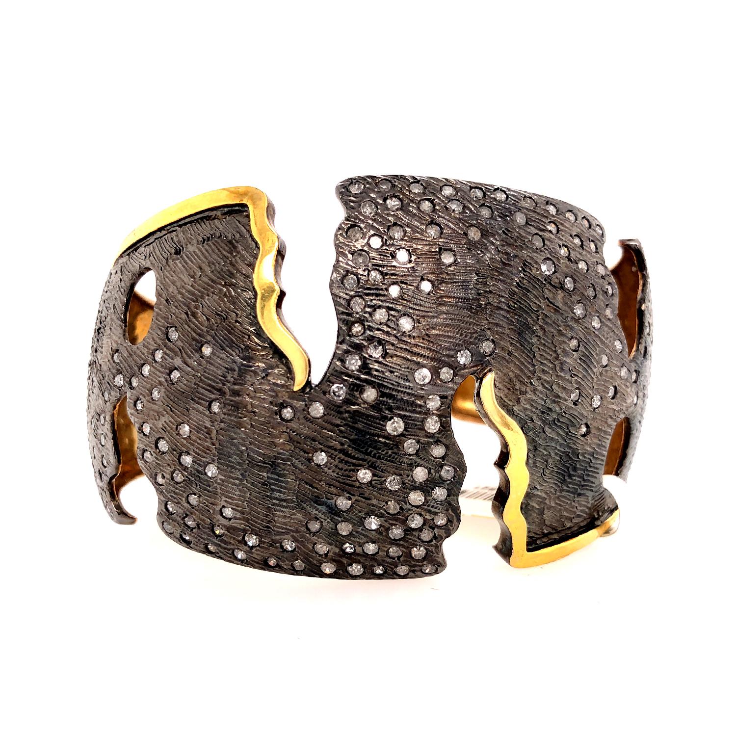 Modern Abstract Two Tone Cuff Bracelet With Flush Set Diamonds In Gold & Silver For Sale