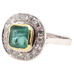 Vintage style emerald and diamonds ring