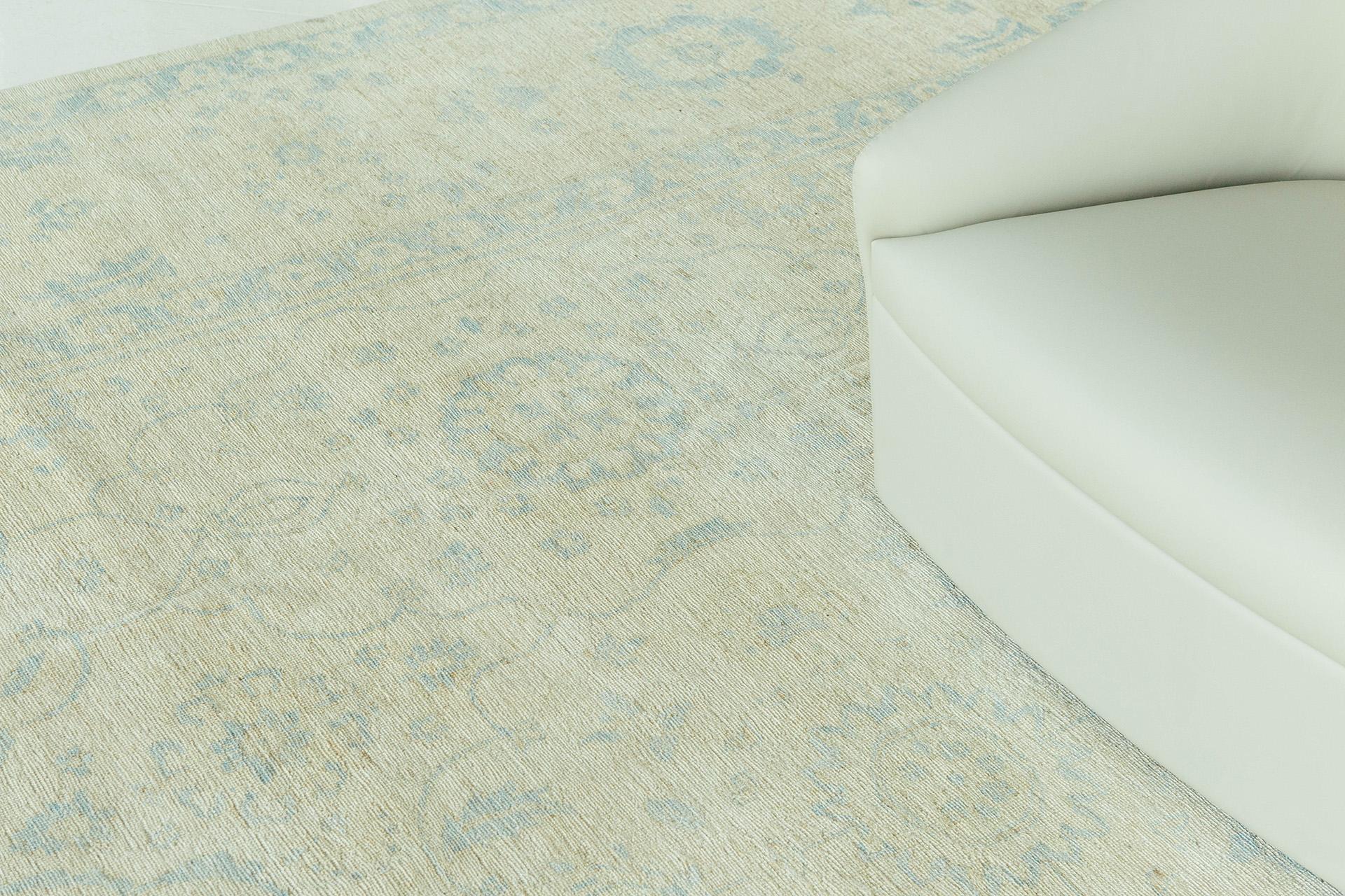 A combination of washed tone of blues and beige from Pakistan are both perfect to elevate your contemporary and modern spaces. This breathtaking floral design rug is well-suited for your living room area where you can relax and feel cozy.

Rug