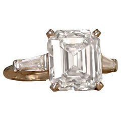 GIA Certified 5.07 Carat H VVS2 Diamond Three-Stone Engagement Ring in 18K Gold