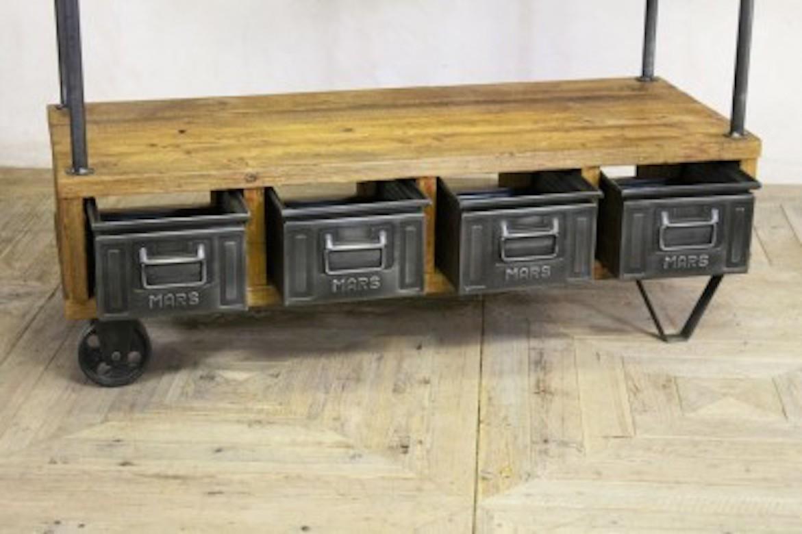 A fine vintage style hall stand, 20th century.

Want something bold, durable, with wood and metal accents? Choose this vintage style hall stand to spice up your interior. The stand features four steel pull out drawers, which are reversible. The