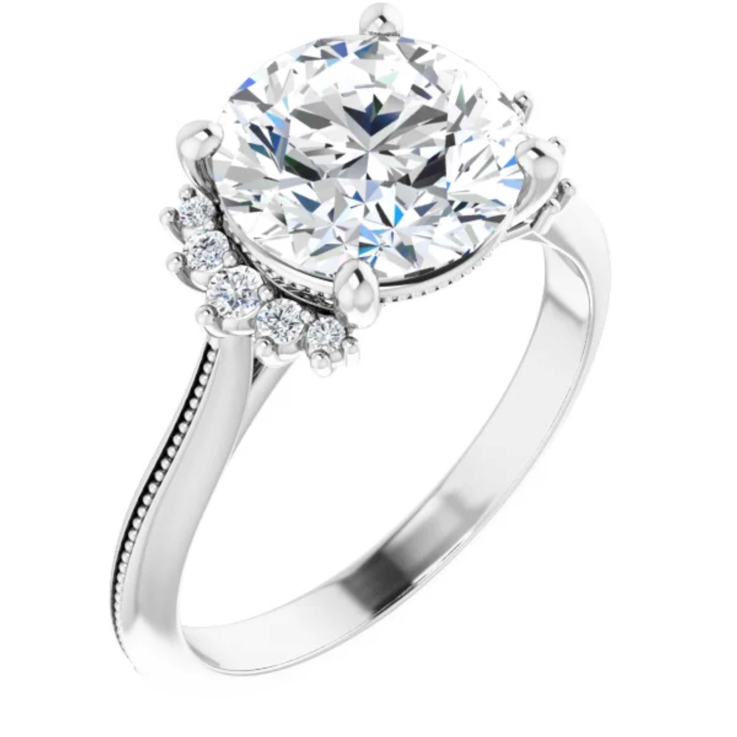 Intricate milgrain detailing adorns the shank of this vintage style engagement ring. Shimmering colorless diamonds surround the halo, making the center stone appear larger. Handcrafted meticulously in 18k white gold, this wedding ring set is a