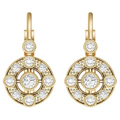 Orecchini in oro 14 con moissanite a raggiera in stile vintage.