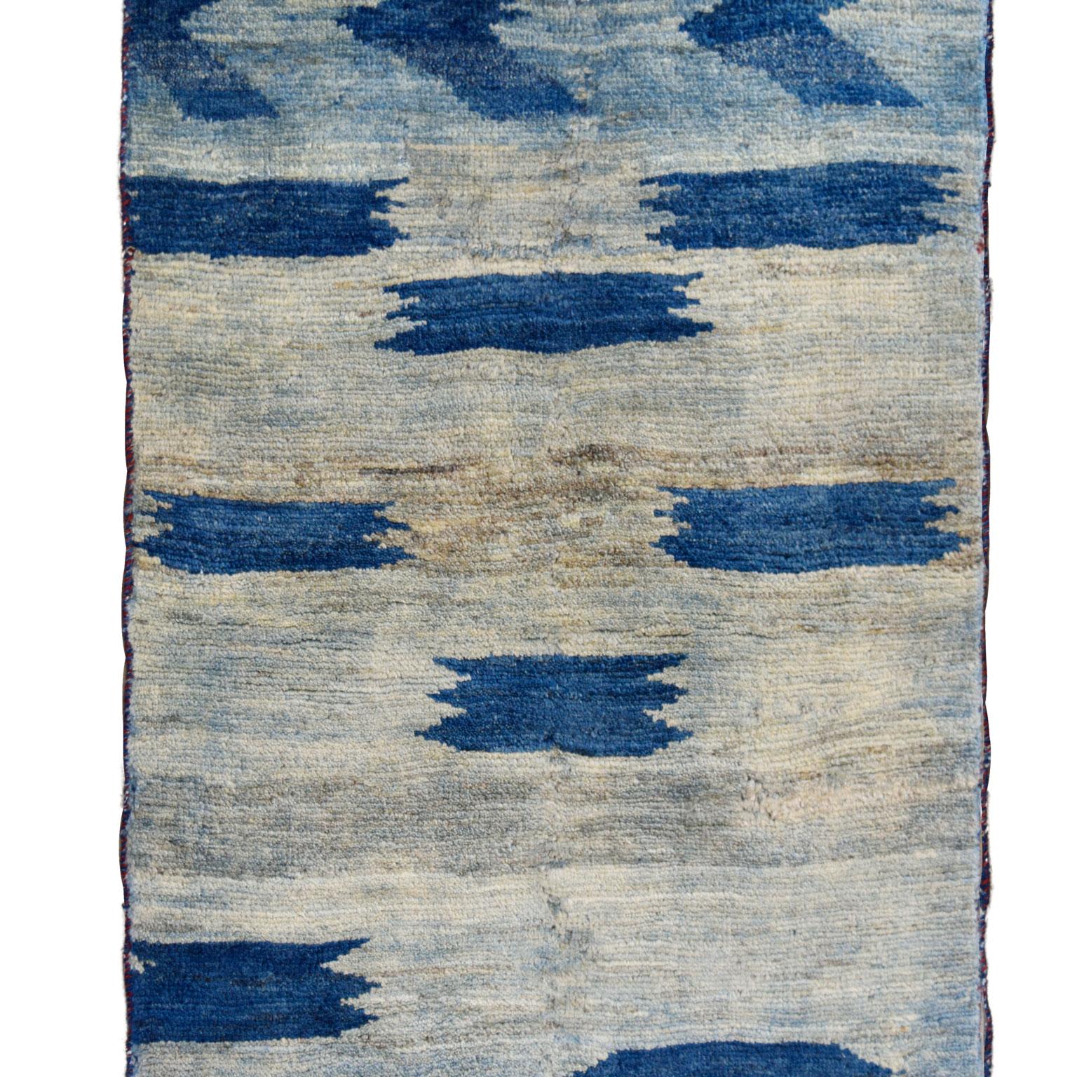 This Persian Luri Gabbeh tribal rug measures 2'4