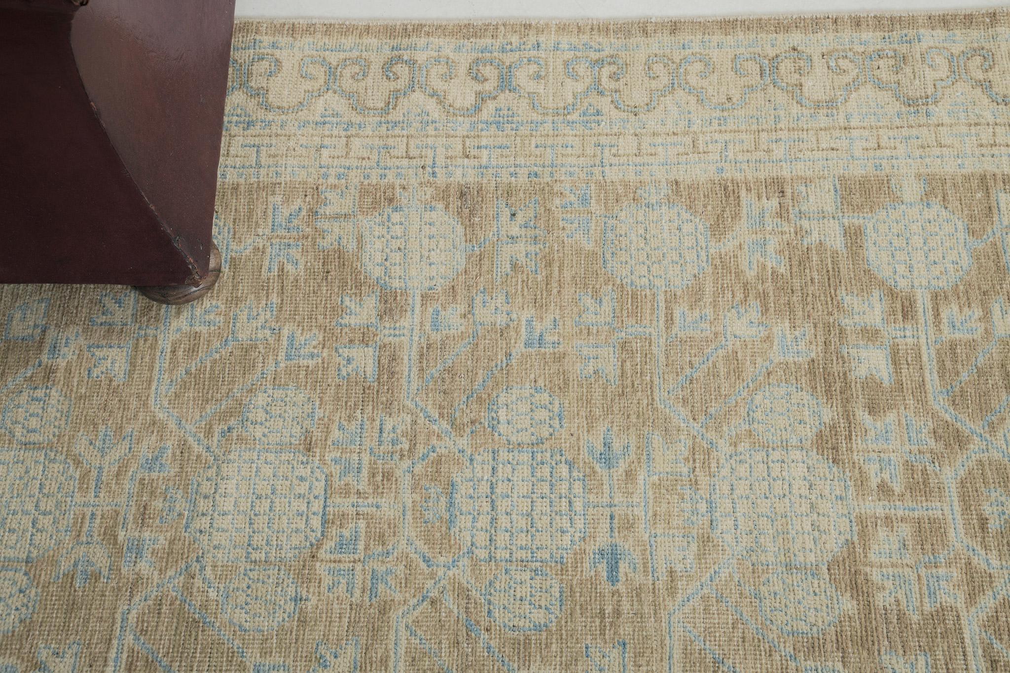 Patterned-positioned pomegranates and ornaments in outlined blue tones dominate the entire pattern of the runner. An excellent pile-woven wool vintage style Khotan design from our Muted Re-Creations collection that is remarkable in any space. Curled