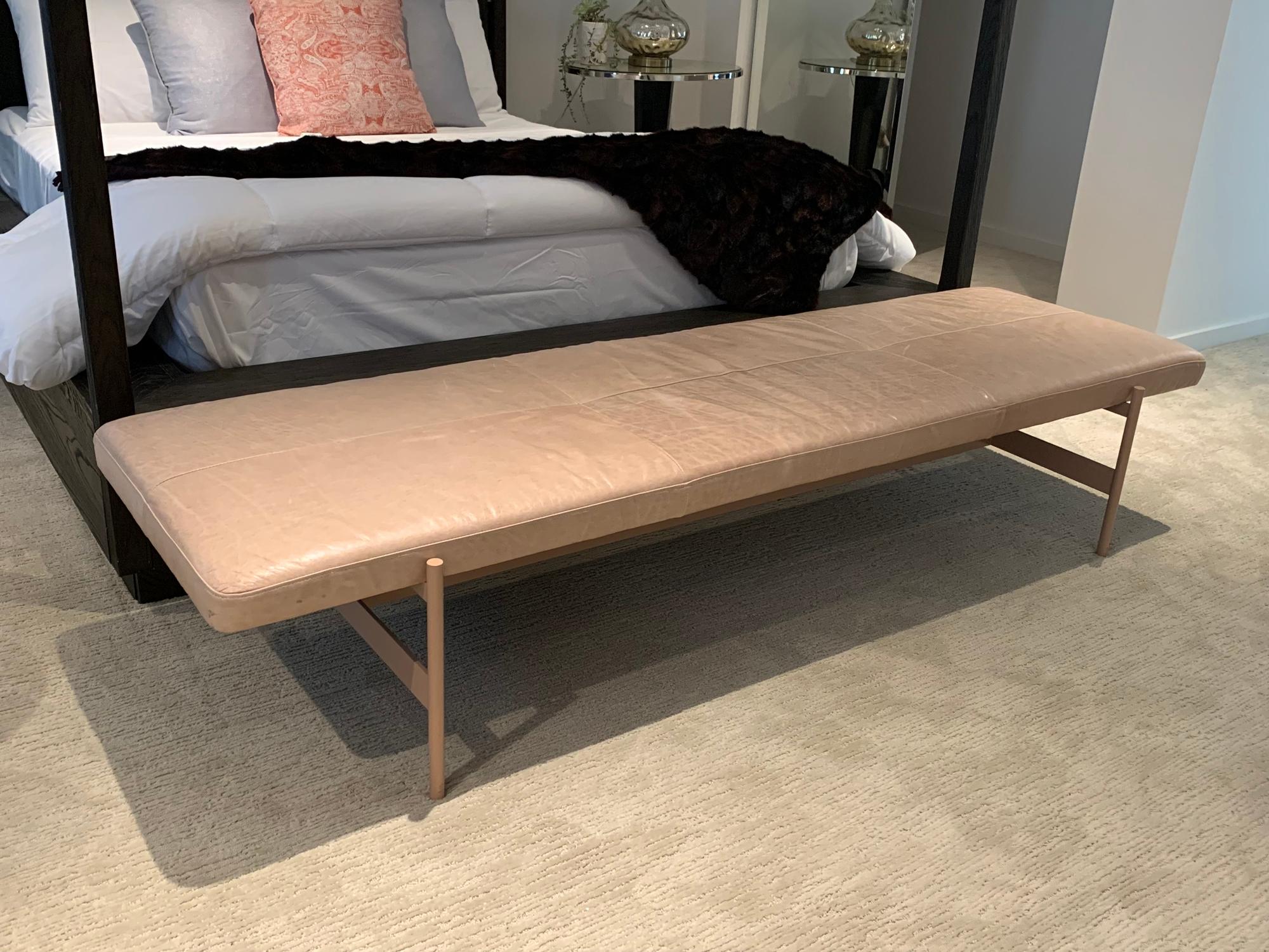 Beautiful long bench in painted metal upholstered in a blush colored leather, very good condition with some wear to leather but no holes or rips, the metal frame is solid and painted in a similar color to the leather.
Measures: 74” wide x 24” deep