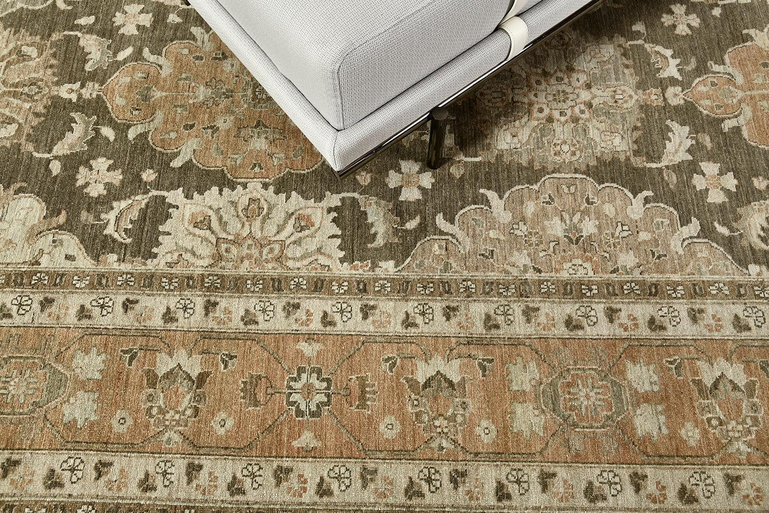 A majestic revival of vintage style Mahal rug that has an alluring impact brought about by its timeless pattern. Featuring the mesmerizing tones of terracotta, dusty blue and ivory, this elegant rug is composed of panels with florid elements