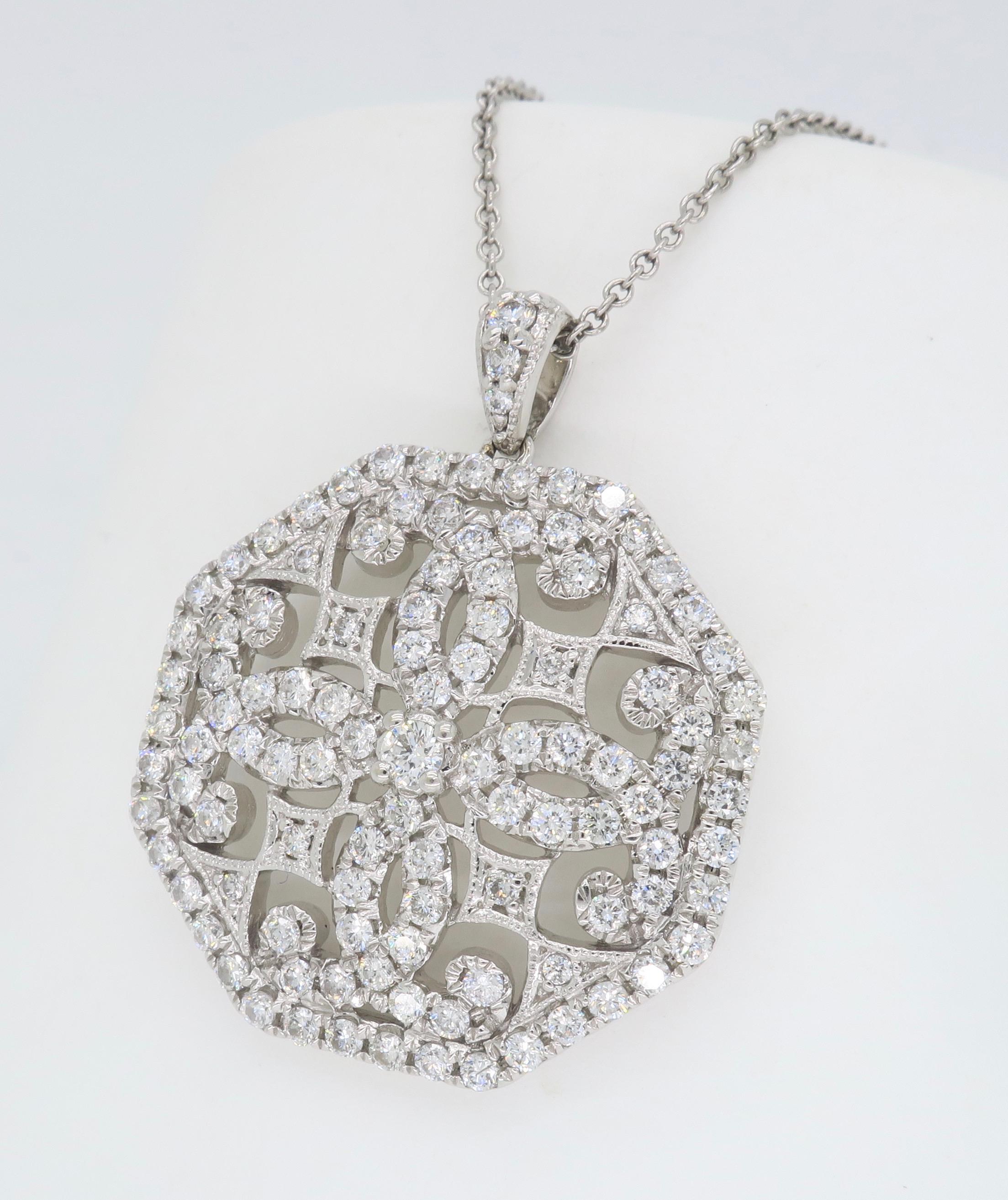 Vintage inspired diamond medallion style necklace set in 14k white gold.

Total Diamond Carat Weight:  Approximately 1.64CTW
Diamond Cut: Round Brilliant Cut
Color: Average G-I
Clarity: Average VS-SI
Metal: 14K White Gold
Marked/Tested: Stamped “14K