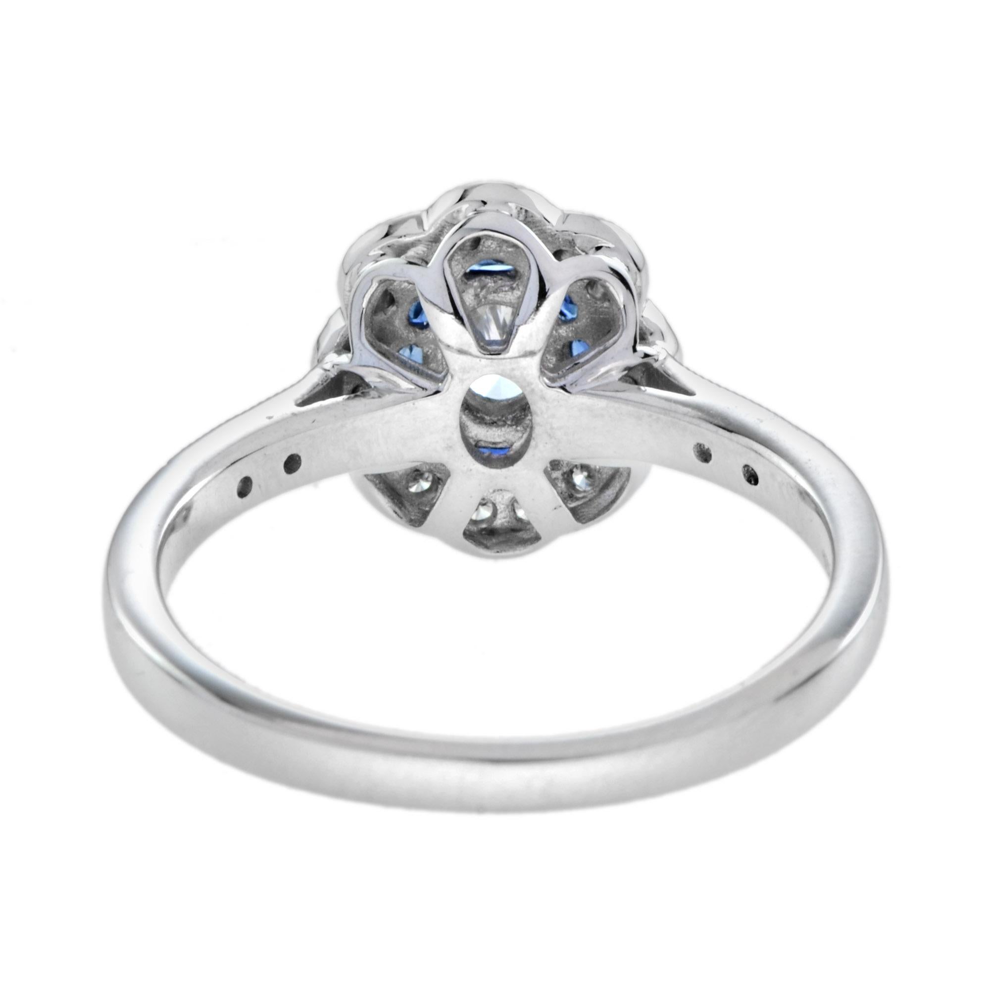 Verlobungsring aus 18 Karat Gold mit ovalem Diamant und blauem Saphir-Halo im Vintage-Stil Damen im Angebot