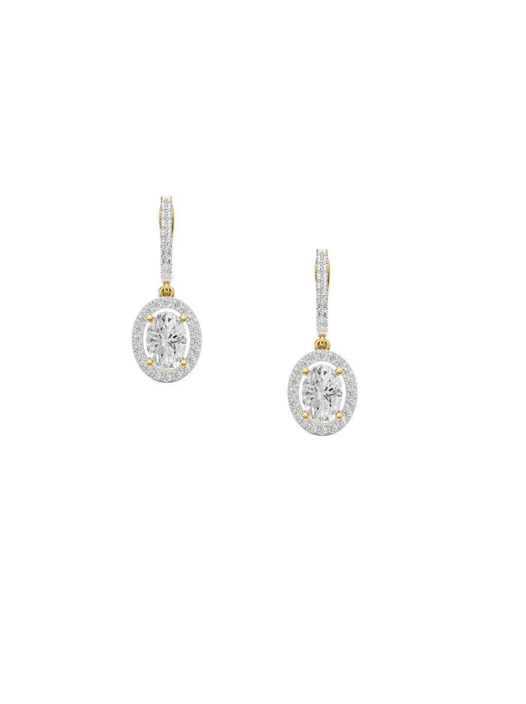 Pendientes de oro 14 con moissanita ovalada de estilo vintage. Corte pera en venta
