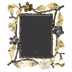 Marco de fotos de estilo vintage, decorado con orquídeas de metal niquelado negro.