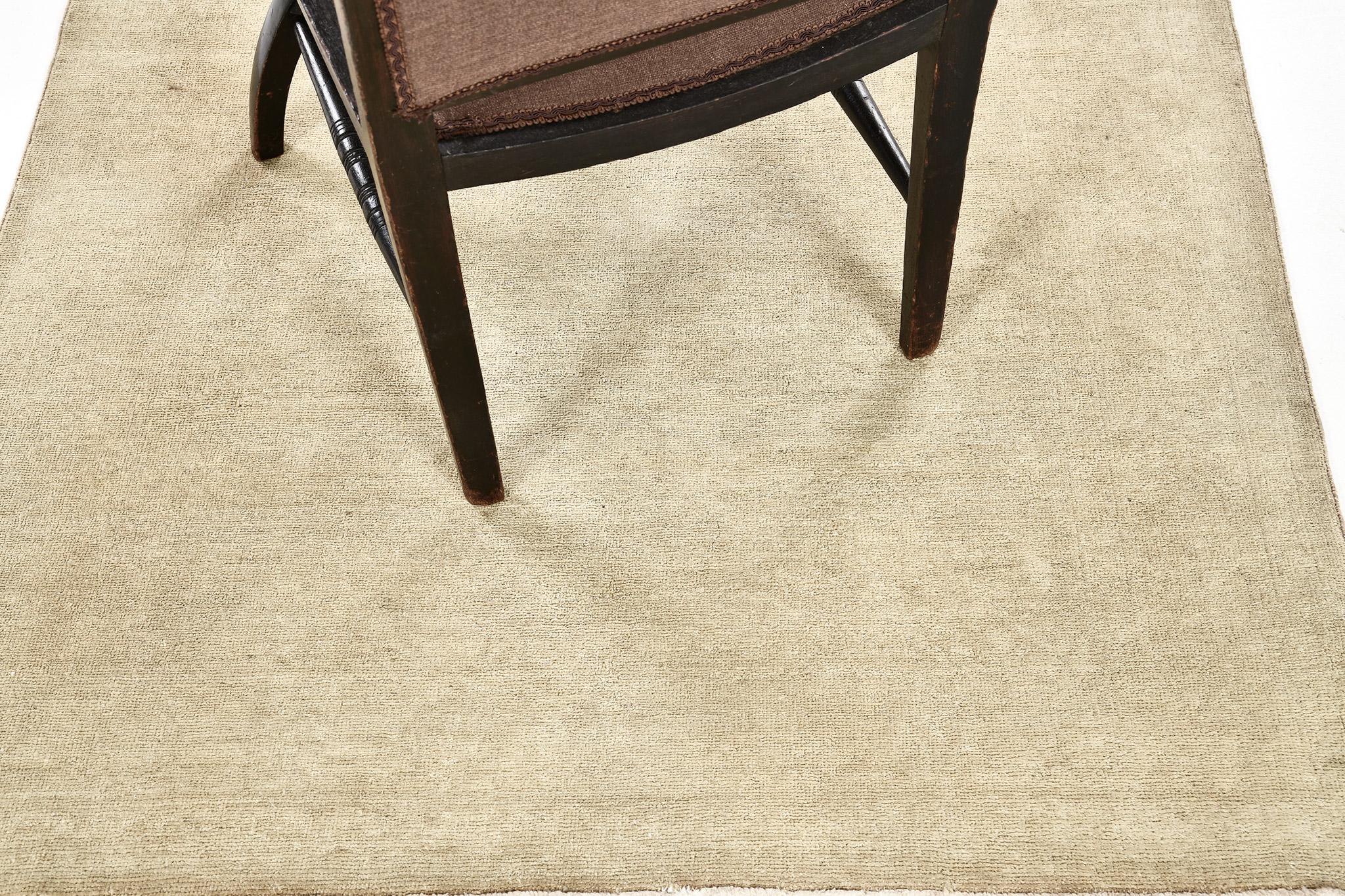 A sophisticated rug that has its simplicity and beauty. Three centered medallions are aligned and surrounded by floral elements to a tan field and completed its details by contrasting into a cream-beige tone. By having this Vintage-Styled Rug from