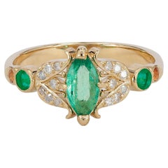 Vintage style ring with emerald in 14k gold