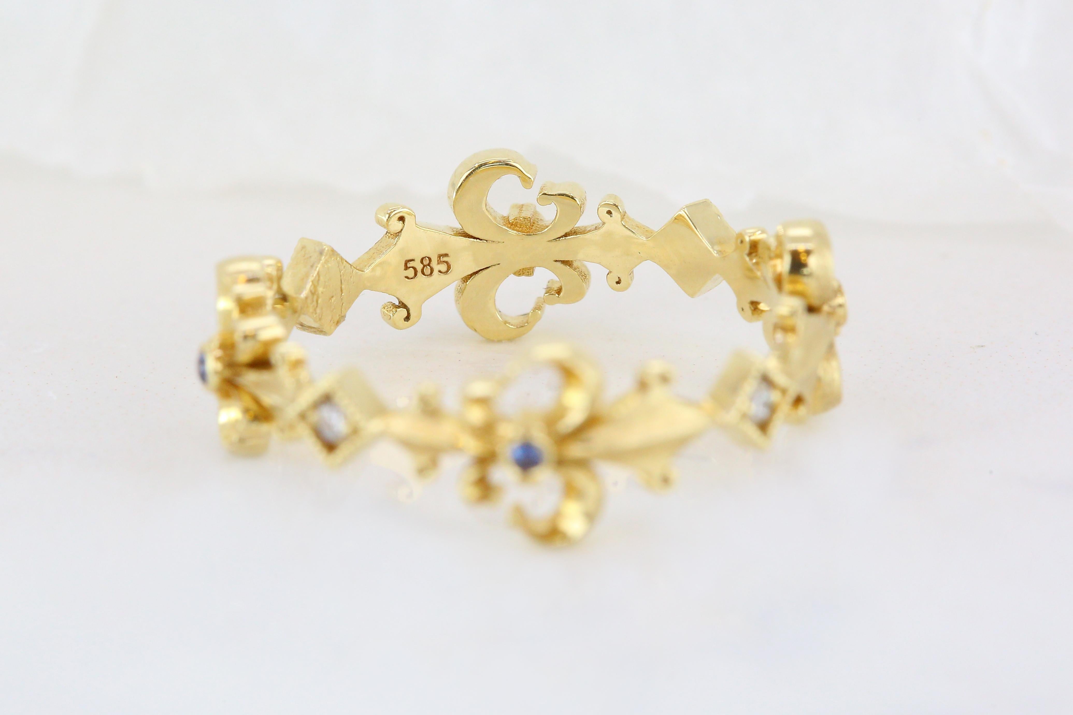For Sale:  14K Gold Vintage Style Sapphire and Diamond Fluer De Lis Wedding Band 17