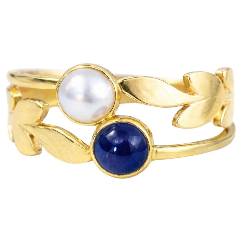 Anillo estilo vintage de zafiro y perlas de plata y oro