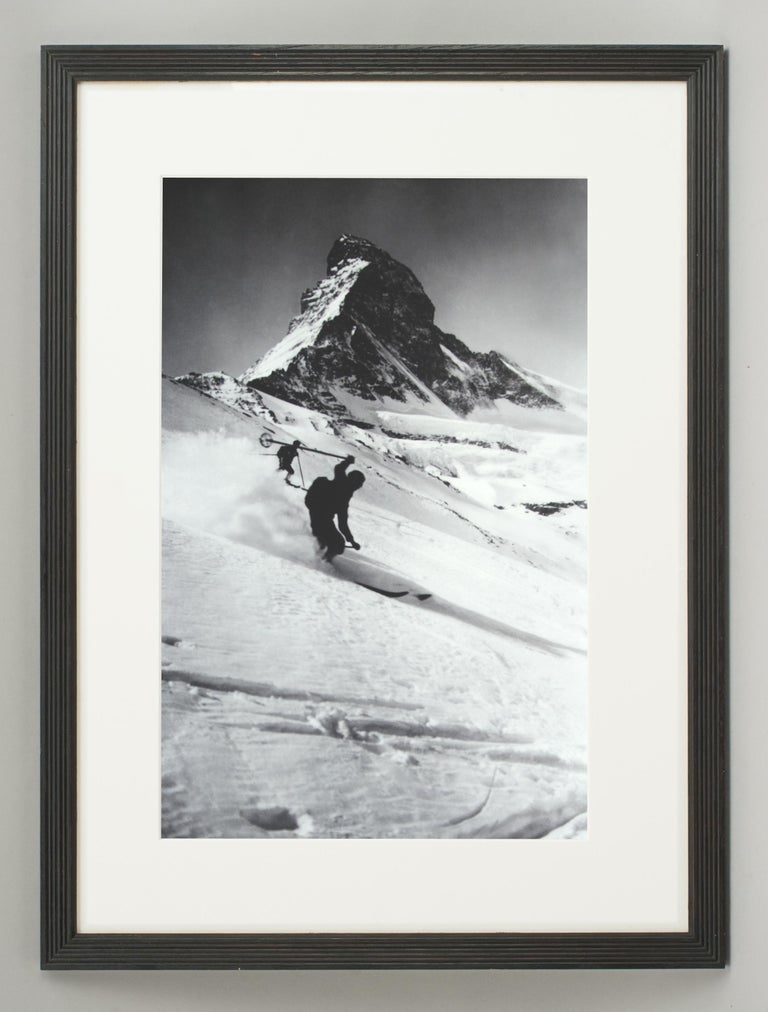 Vintage style Ski photography, framed Alpine Ski photograph, Matterhorn & Skiers.
'MATTERHORN & SKIERS', a framed and mounted black and white photographic image after an original 1930s skiing photograph. The frame is a hand colored reeded wooden