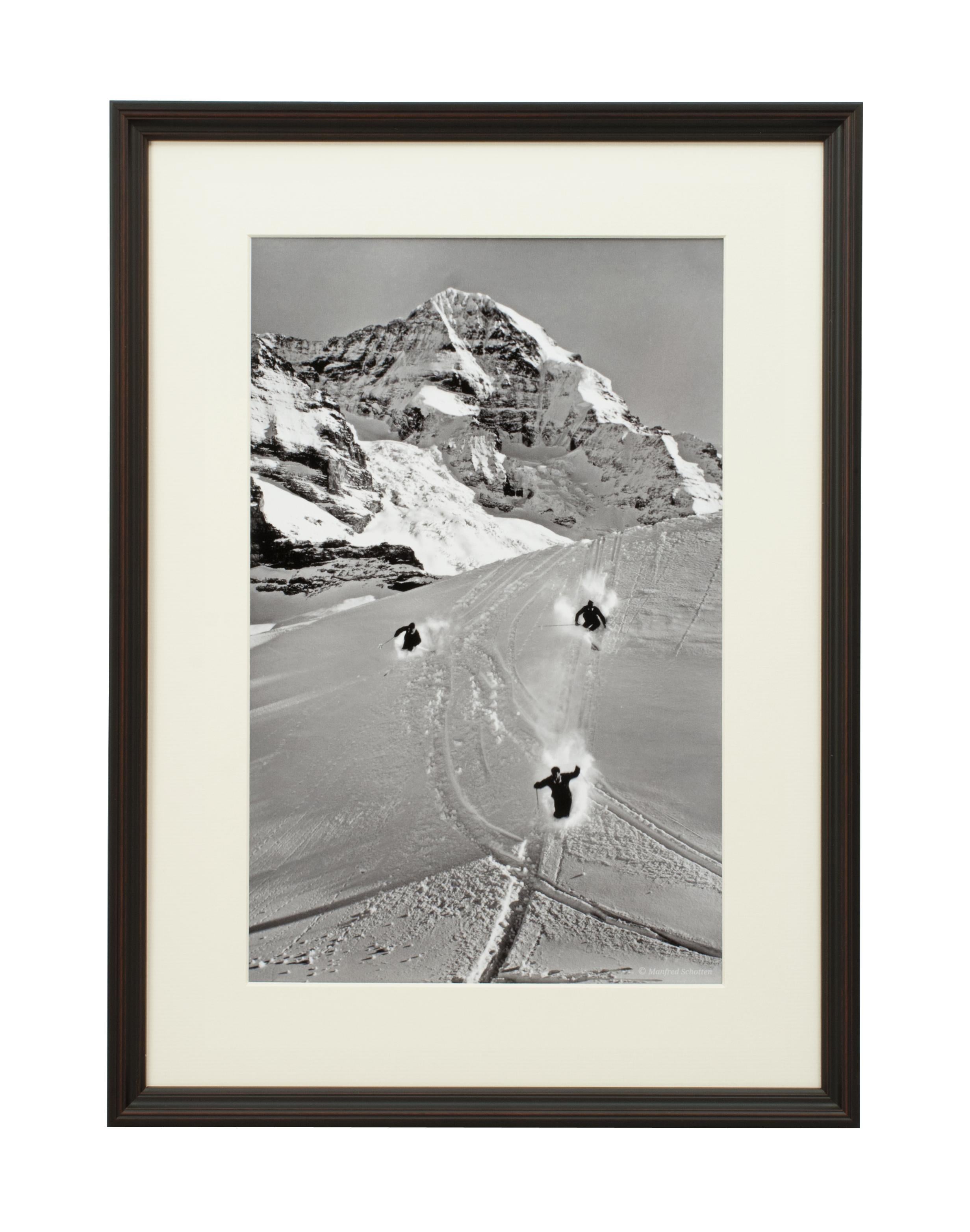 Vintage Style Ski Photography, Framed Alpine Ski Photograph, Scheidegg.
'SCHEIDEGG', a modern framed and mounted black and white photograph after an original 1930's skiing photograph. The frame is black with burgundy undercoat, the glazing is