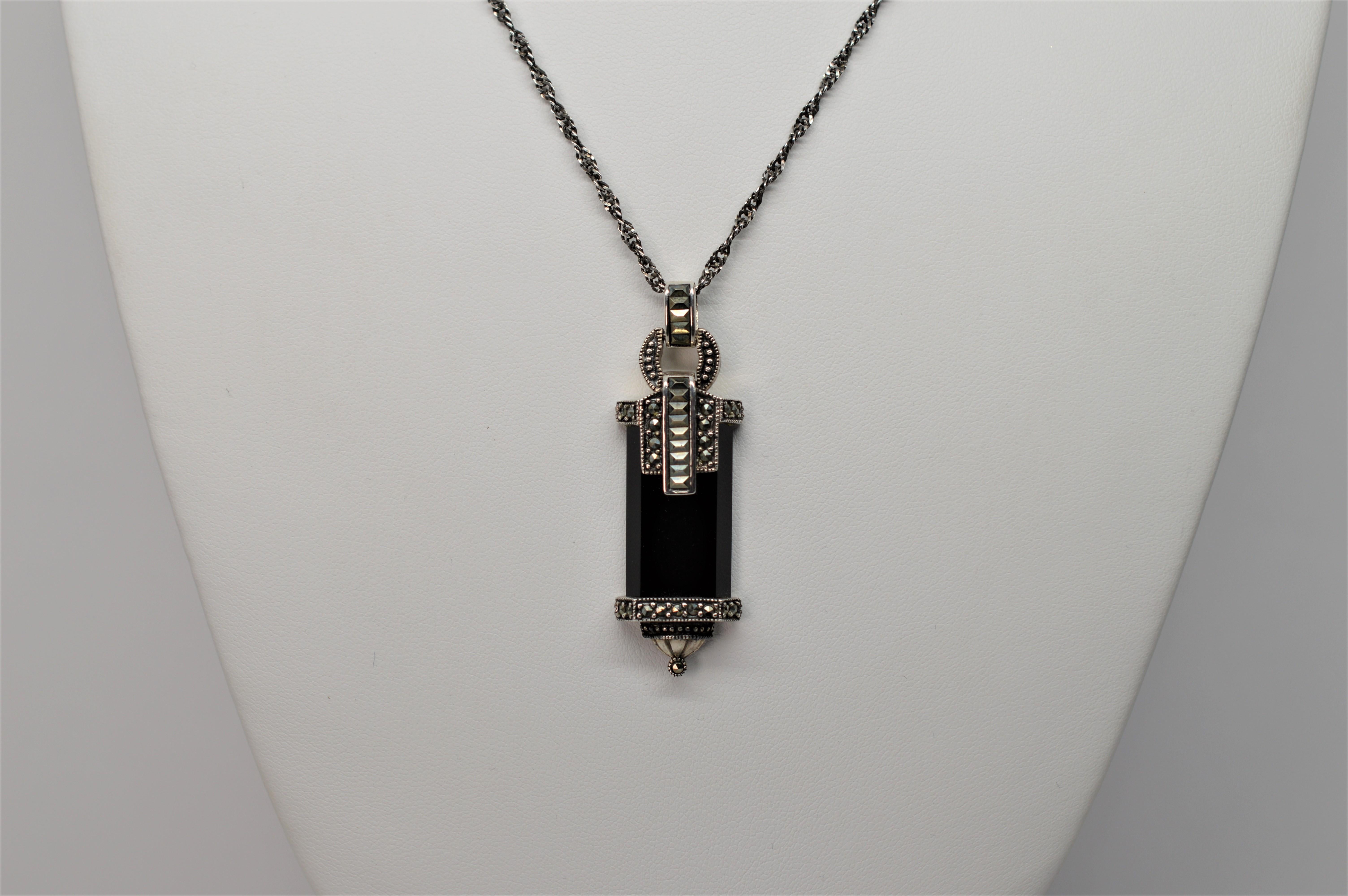 black and silver pendant necklace