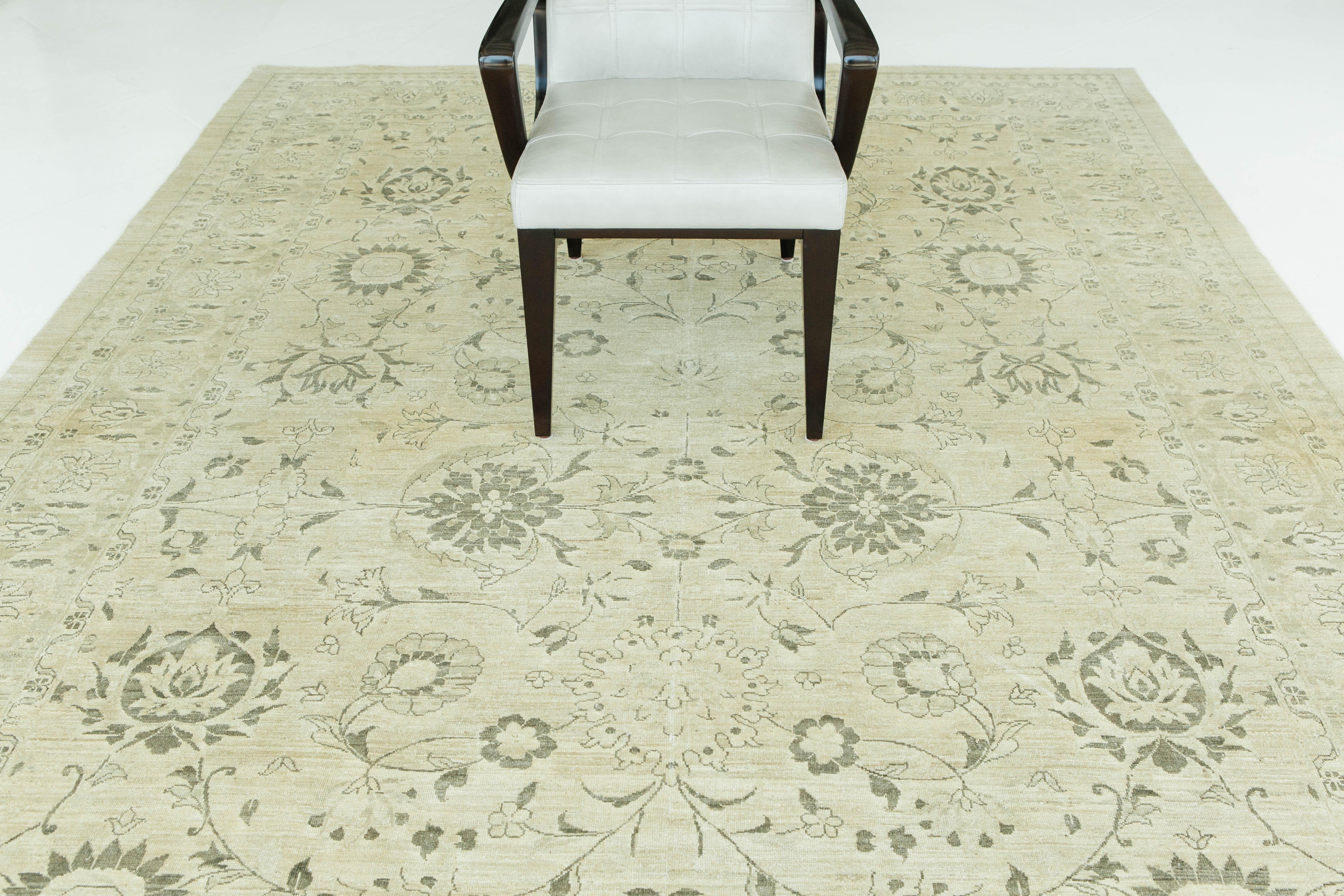 A vintage style Persian Sultanabad recreation with beautiful floral motifs and vine work. Luxurious wools in various hues of gray create a cohesive and timely design. Sultanabad in northwest Iran (current day Arak), was a prominent center of village