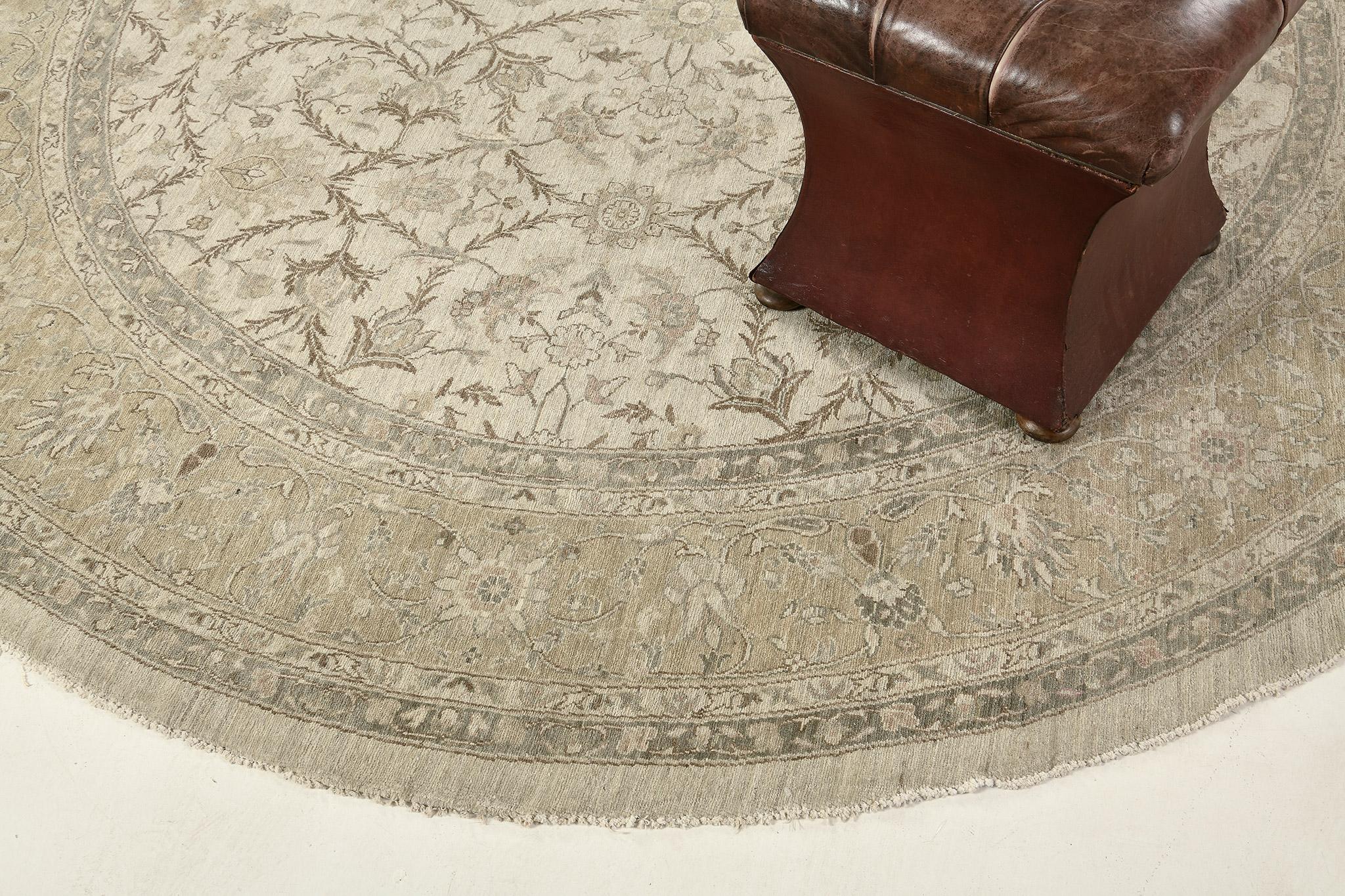 Series of mirrored florid ornaments and vines are reflected through muted embellishments to snow-white fields. The borders are beautifully hand-woven that created from a vegetable dye to form an elegant Sultanabad Round Rug. Truly a divine creation
