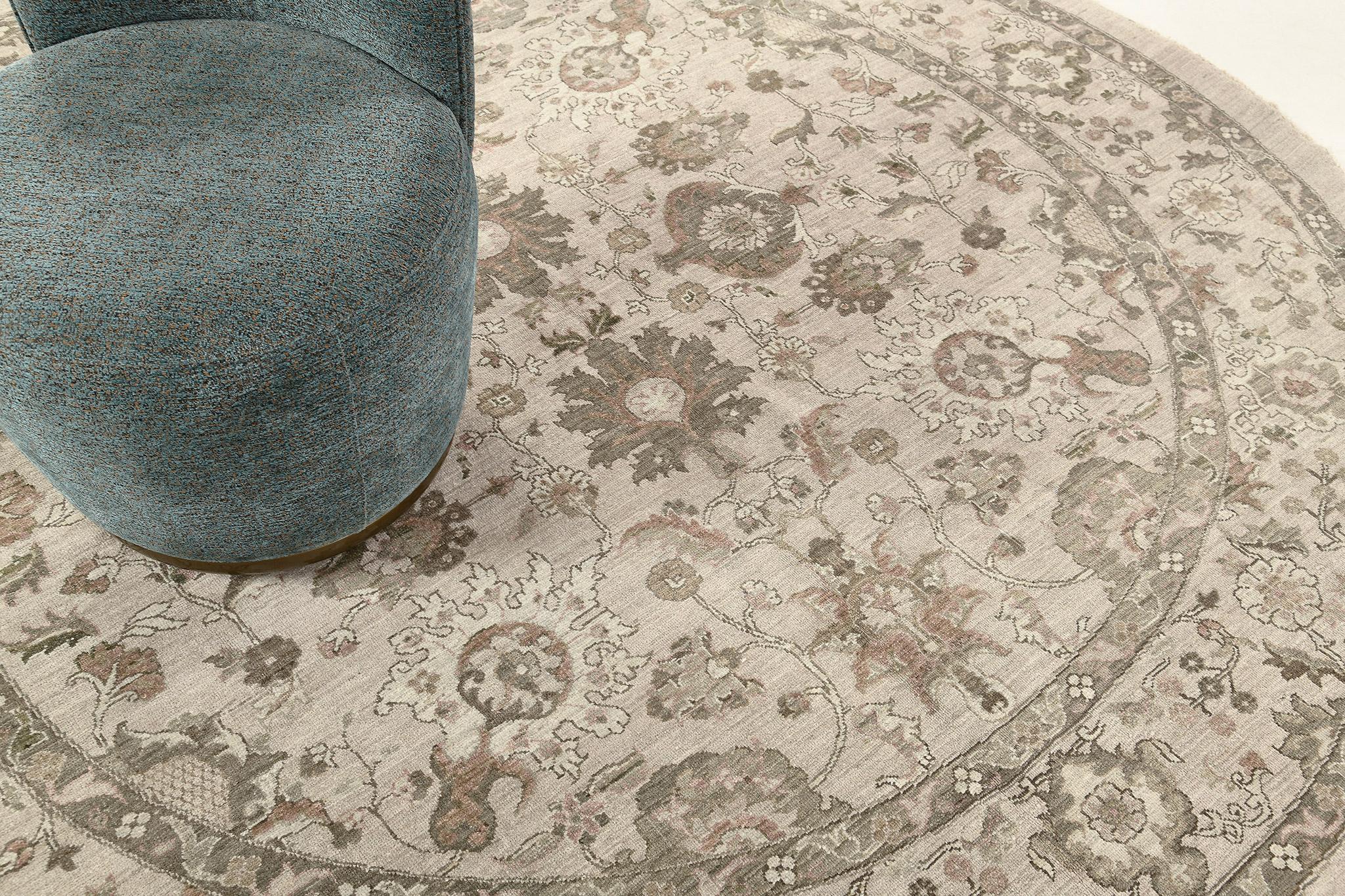 Series of mirrored florid ornaments and vines are reflected through charcoal embellishments with fall-themed accents to the grayscale field. The borders are beautifully hand-woven that created from a vegetable dye to form an elegant Sultanabad Round