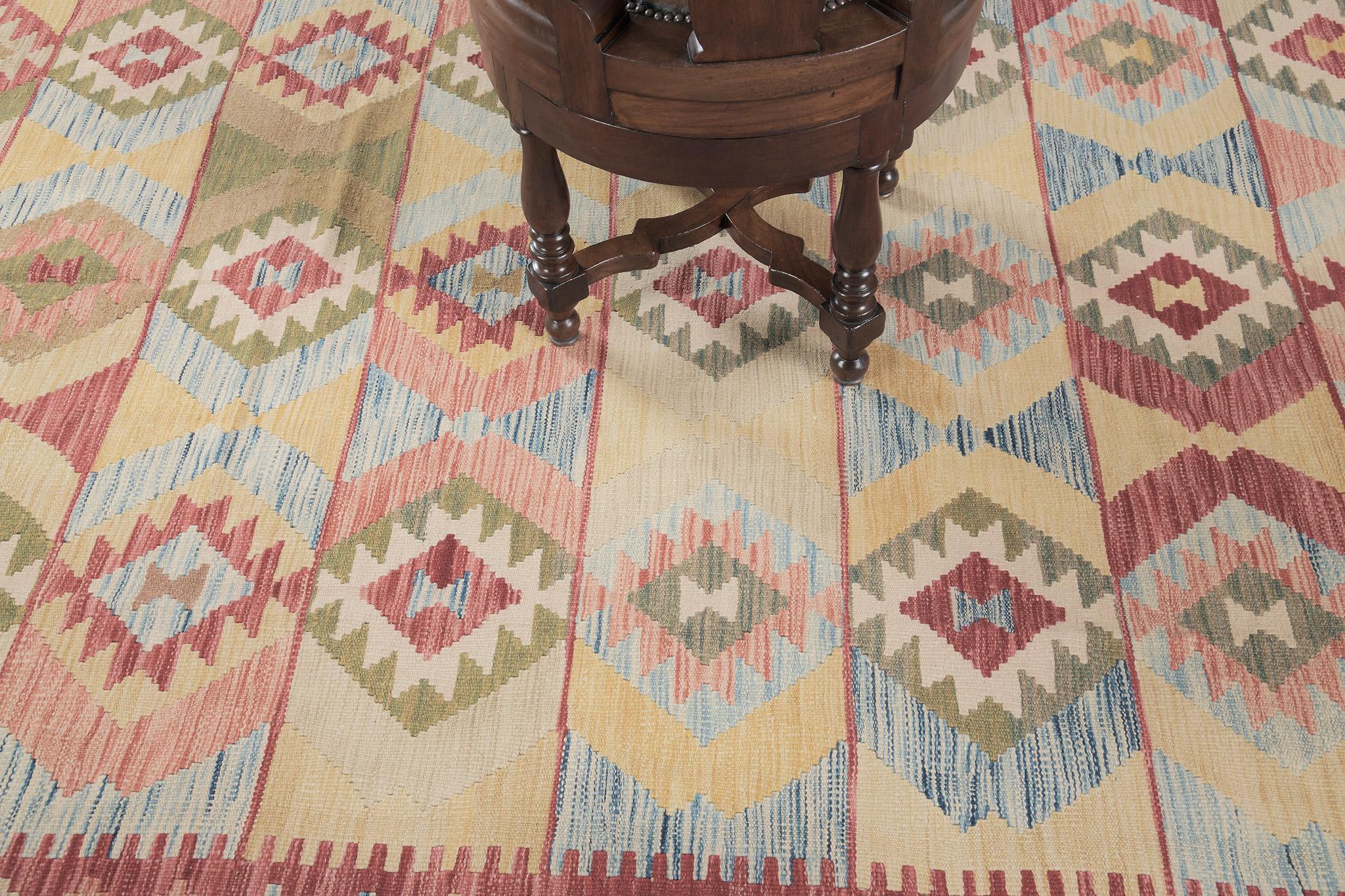 This flatweave kilim features a series of diamond patterns in a festive theme. Surrounded by geometrical motifs that add tone to the rug. Best suitable for modern interiors with a touch of ethnic or traditional theme.

Rug Number 24928
Size 6' 6