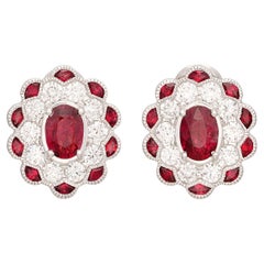 Orecchini in oro bianco con rubini e diamanti in stile vintage