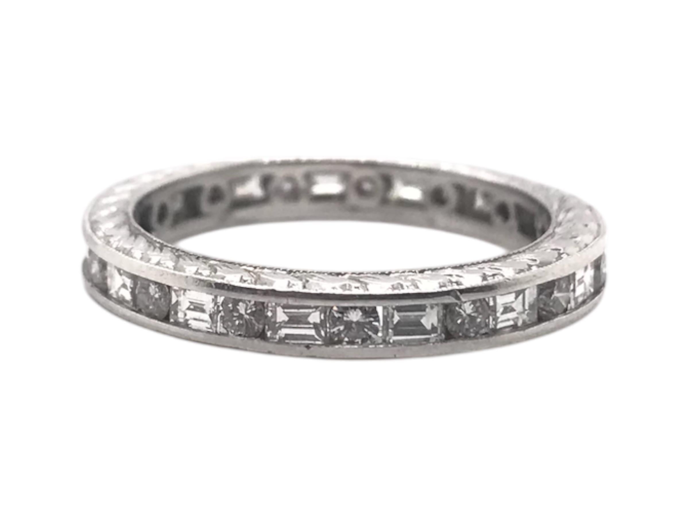 This lovely band is the perfect combination of vintage & modern!
The ring has vintage styled wheat pattern engraving details on the side.

Diamond Details: 
15 - 2.0mm Round Brilliant Cut Diamonds
FG Color; VS Clarity; Estimated Combined Weight: