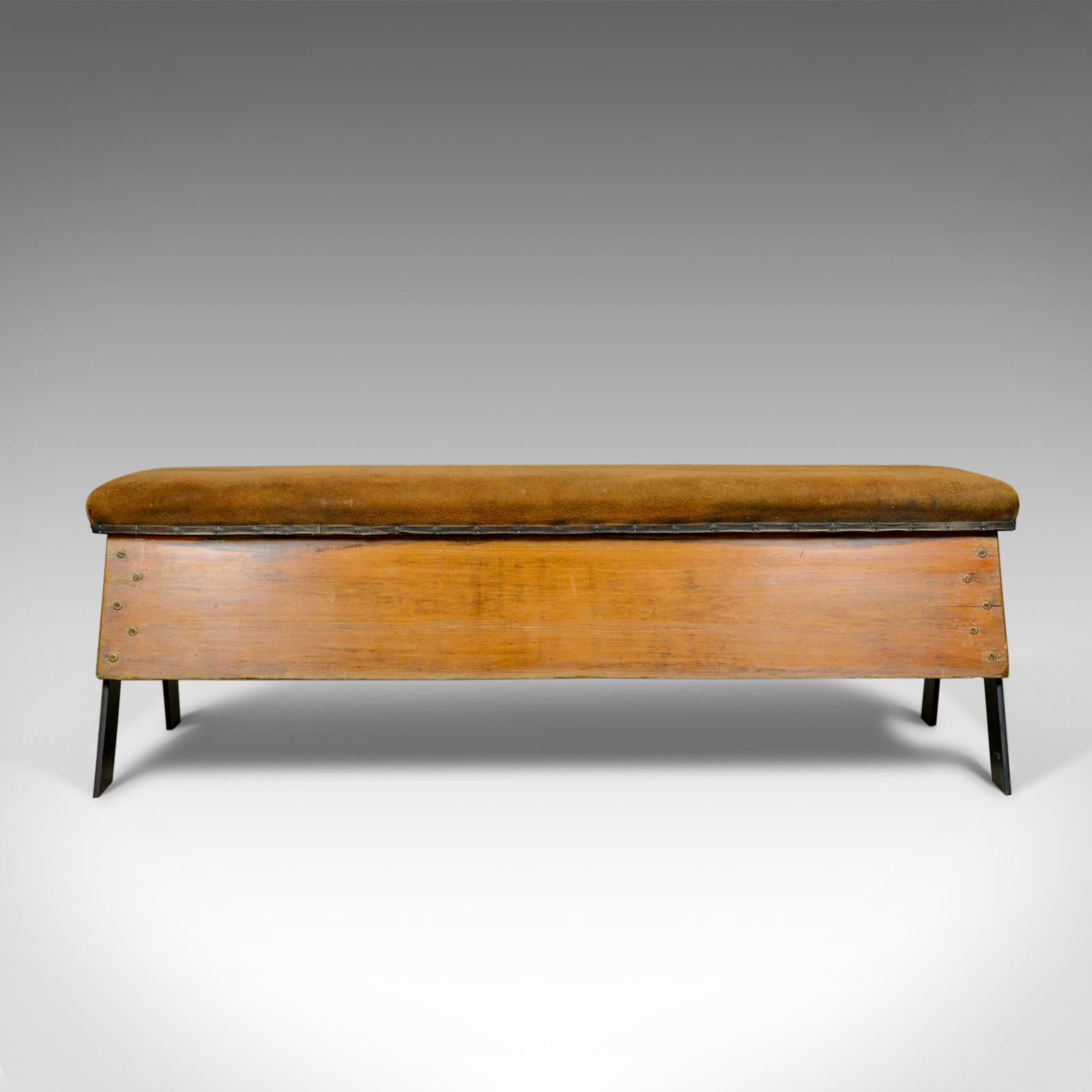 This is a vintage suede top bench. A vaulting horse converted into a three seat bench, ideal for the dining table, hall or lying on in the gym.

Fabulous and comfortable bench
Offering a deep seat at a good height
Robust and sturdy, raised on