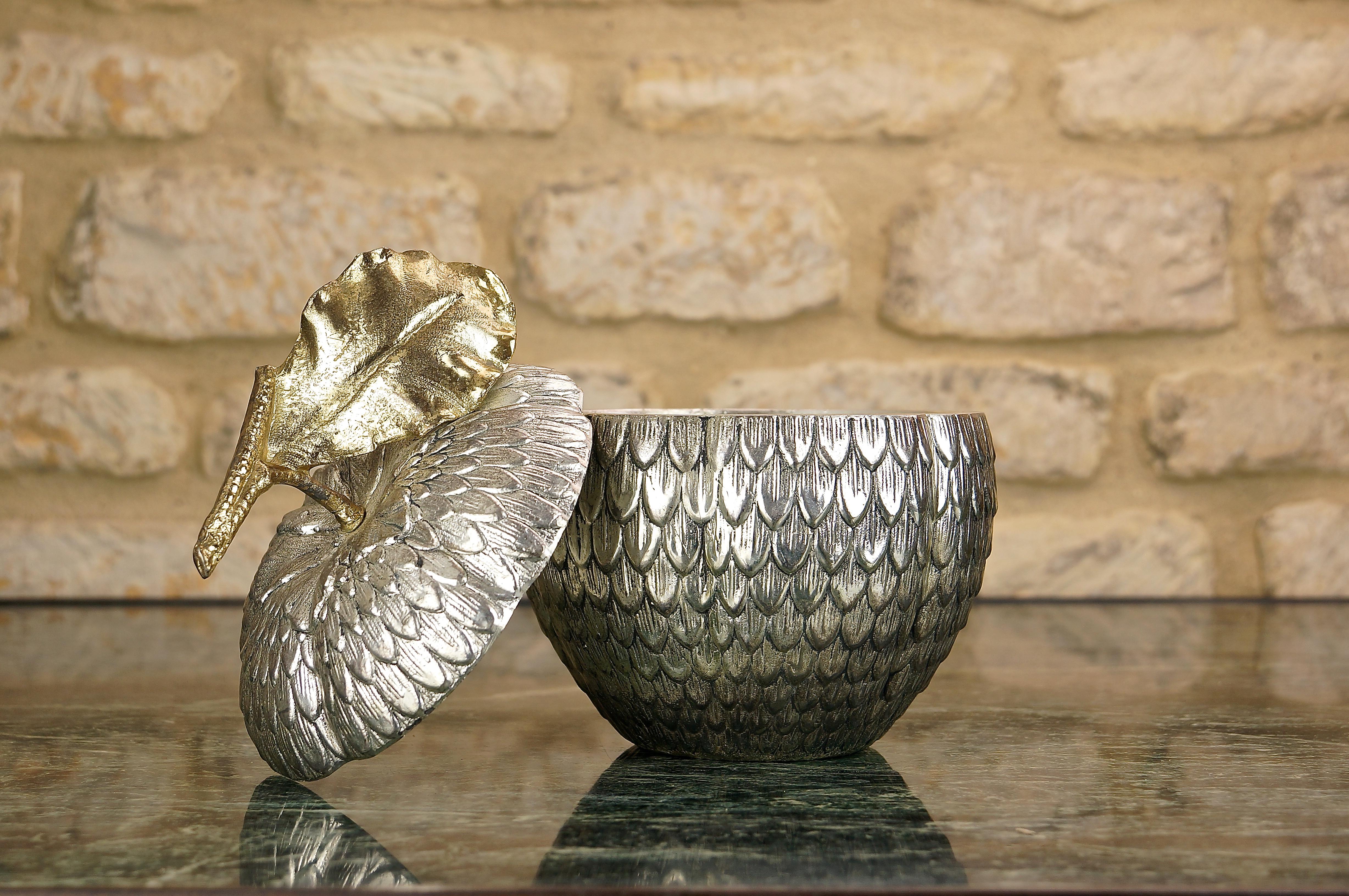 Vintage sugar apple ice bucket by Mauro Manetti, Italy, 1960s

This stunning ice bucket was designed and made by Mauro Manetti (stamp on the base) and the shape is that of a sugar apple, with a gilt leaf and a silver gilt body.

It is sure to