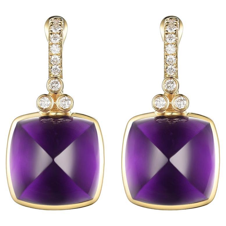 Add a touch of regal elegance to your jewelry collection with these stunning earrings, crafted in 14K gold. Featuring two mesmerizing 20.45-carat amethysts, their deep, rich purple hue exudes sophistication and grace. Each earring is adorned with
