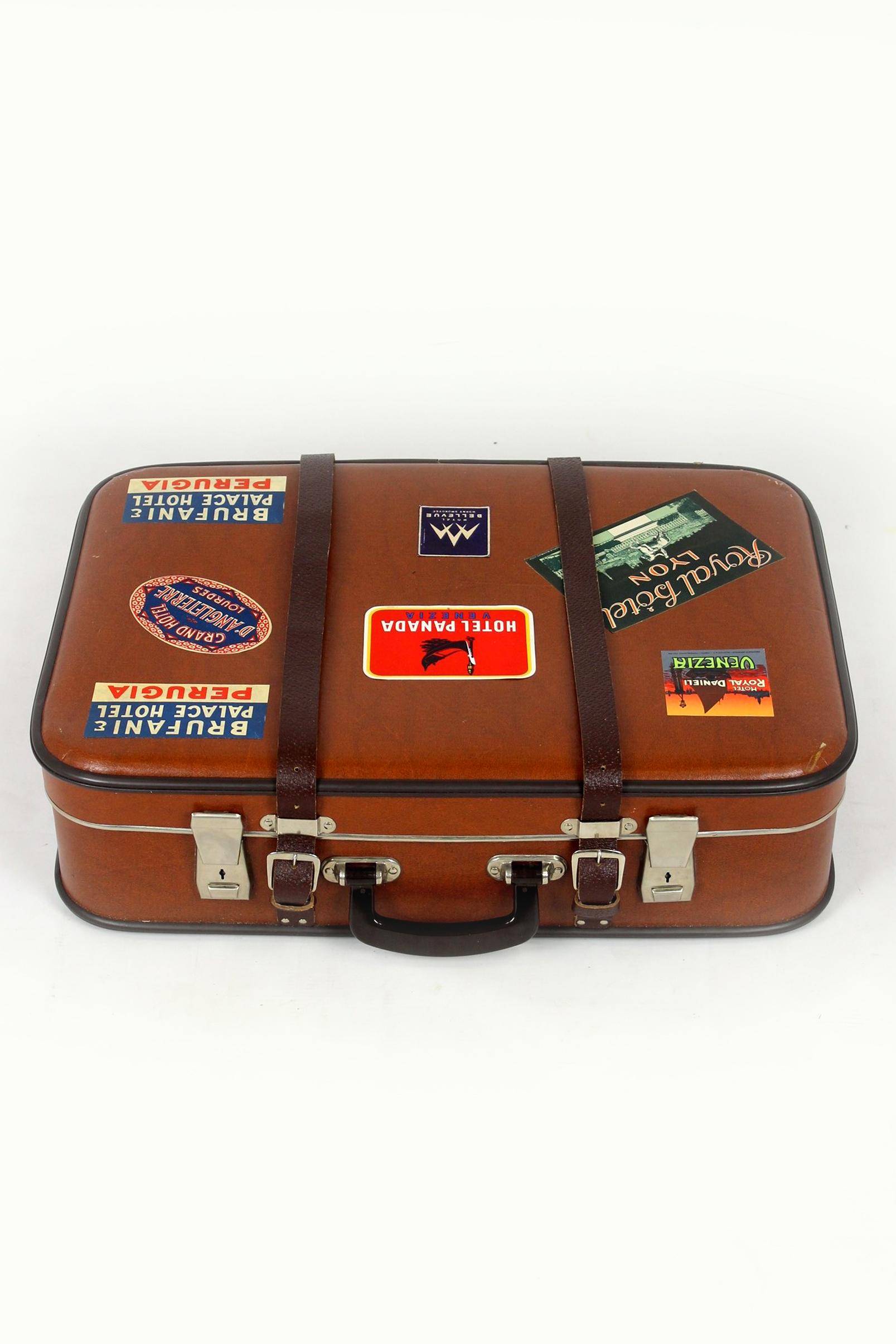 This travel suitcase was produced in the Czech Republic in the 1960s. The suitcase is in very good condition with original stickers from popular tourist places in Europe.
