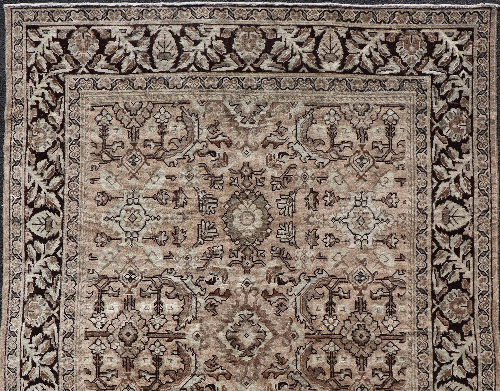 Vintage Sultanabad-Mahal rug with All-Over Sub-Geometric Medallion Design 

This vintage Persian rug features an all-neutral palette of creams, taupe, and cocoas. The field as floral medallion and motifs. The border with a separate floral design
