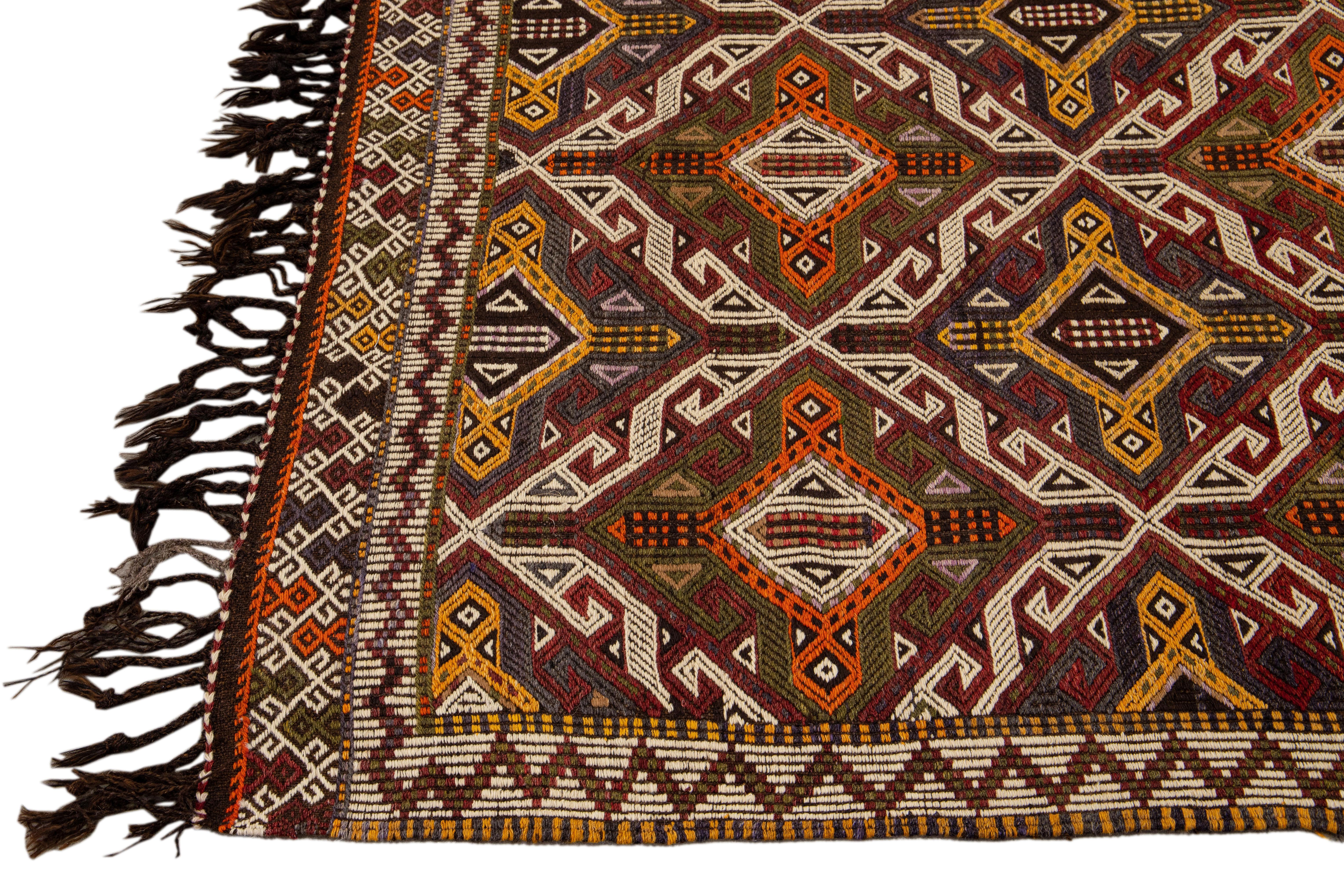 Indian Vintage Sumack Handmade Geometric Designed Multicolor Wool Rug For Sale