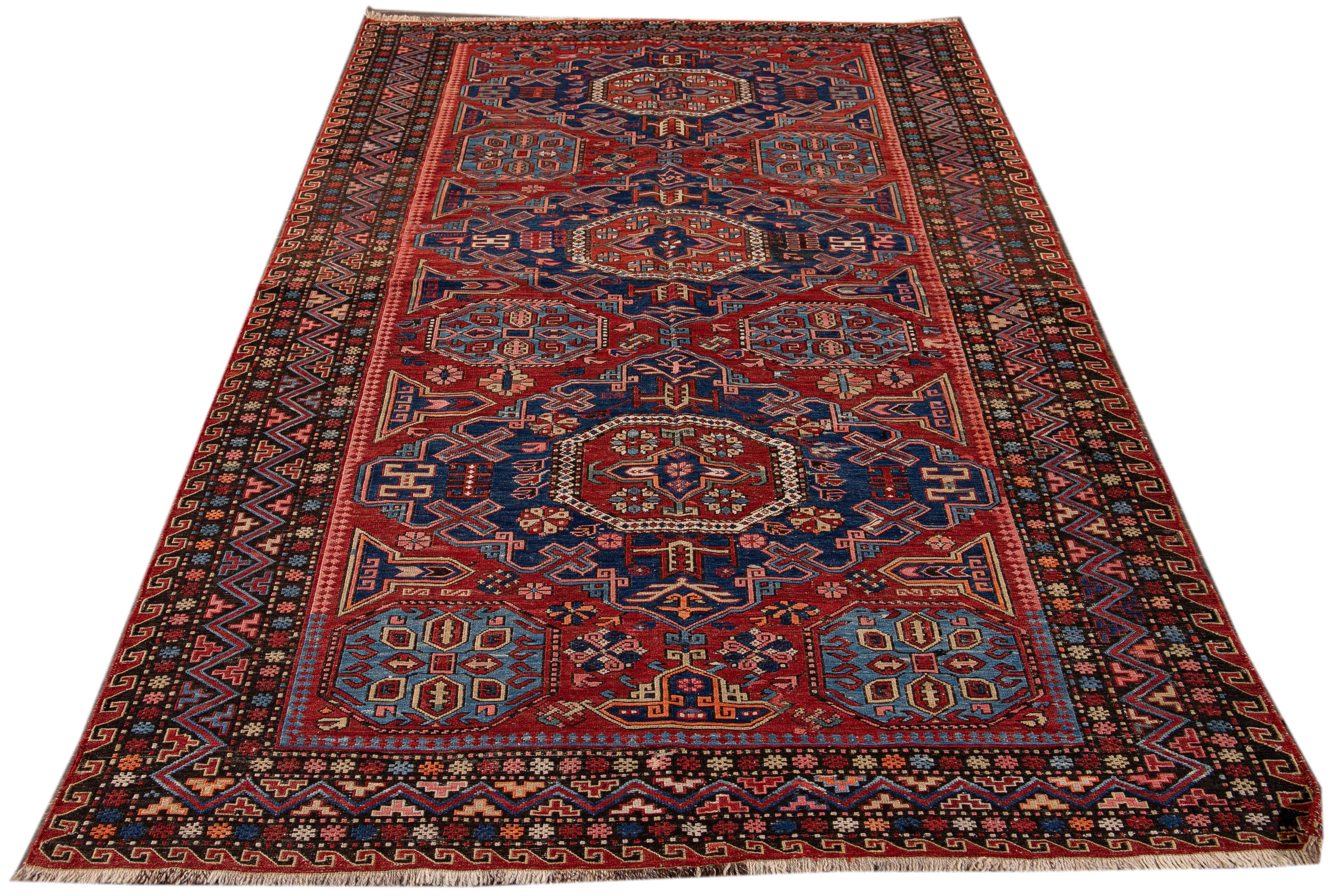 Bohemian Vintage Sumakh Handmade Red and Blue Medallion Wool Rug For Sale