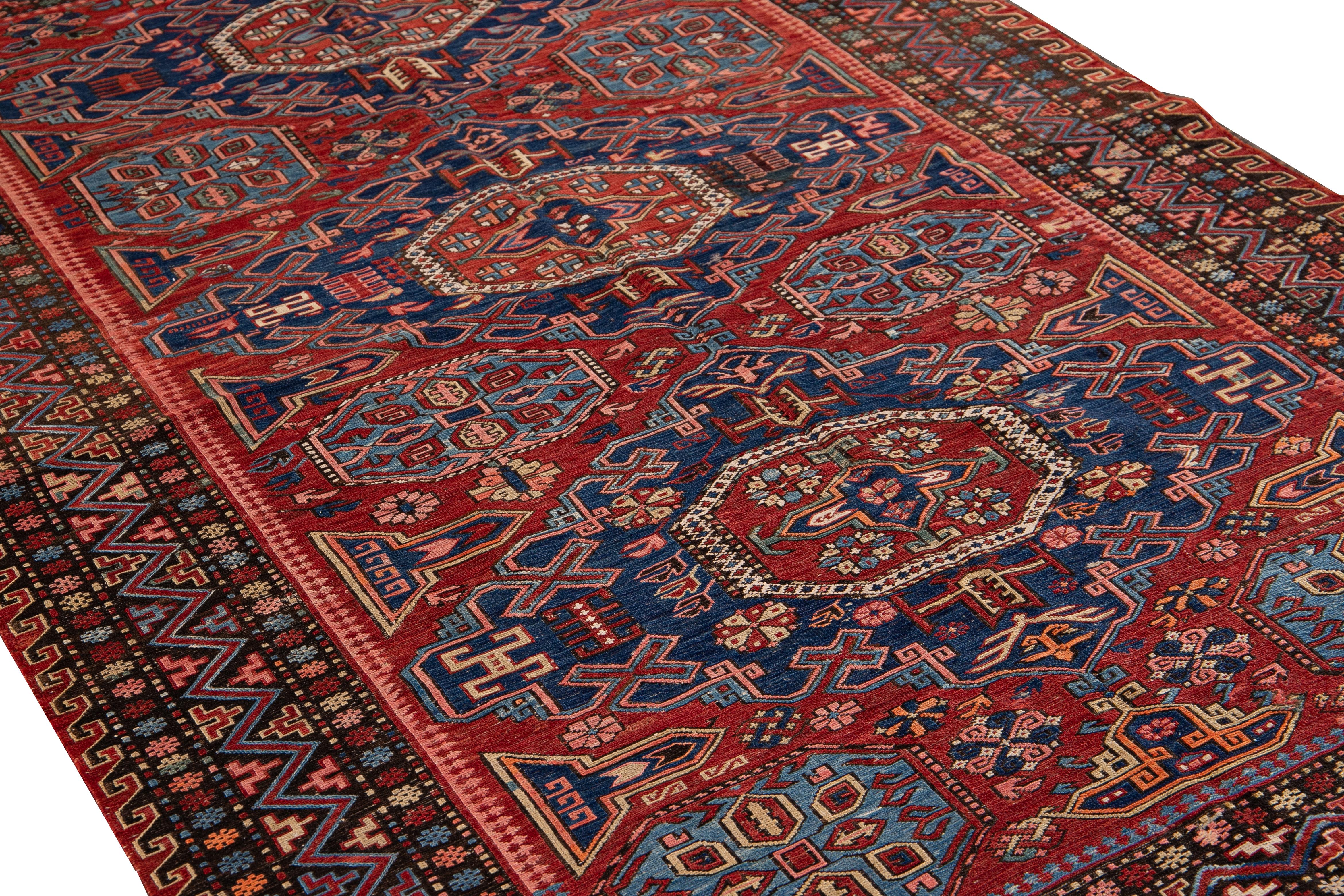 Hand-Knotted Vintage Sumakh Handmade Red and Blue Medallion Wool Rug For Sale