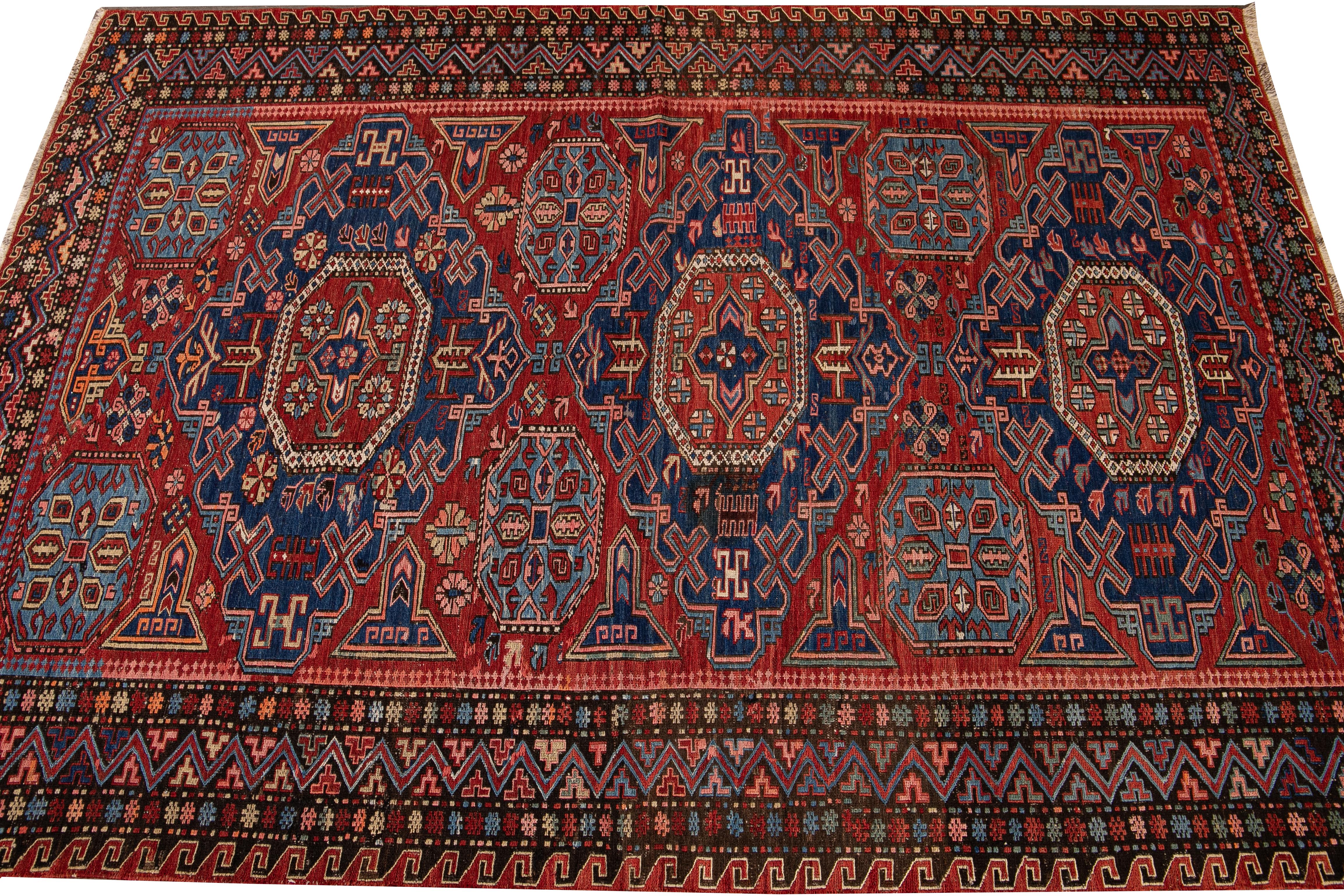 Vintage Sumakh Handmade Red and Blue Medallion Wool Rug In Excellent Condition For Sale In Norwalk, CT