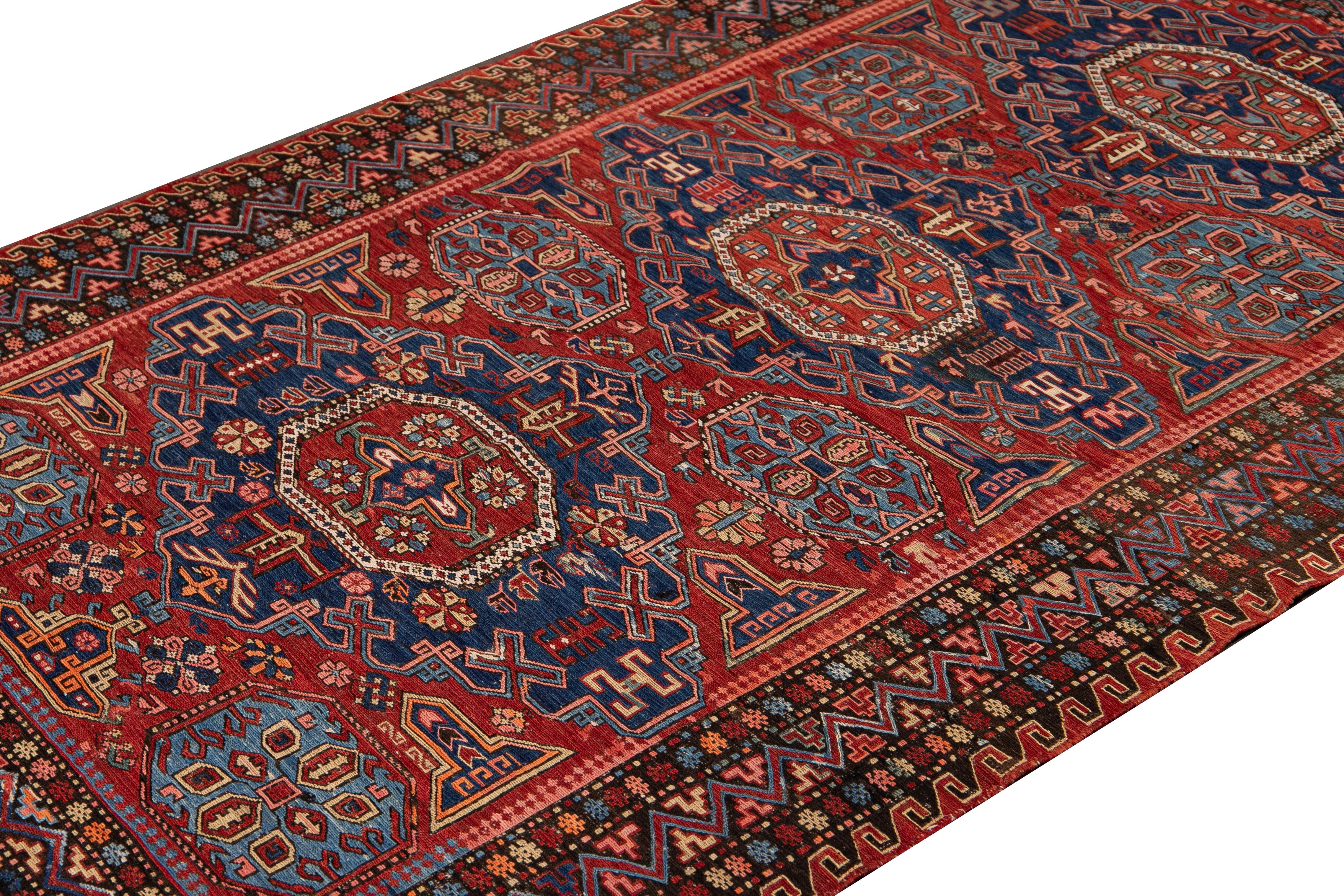 20th Century Vintage Sumakh Handmade Red and Blue Medallion Wool Rug For Sale