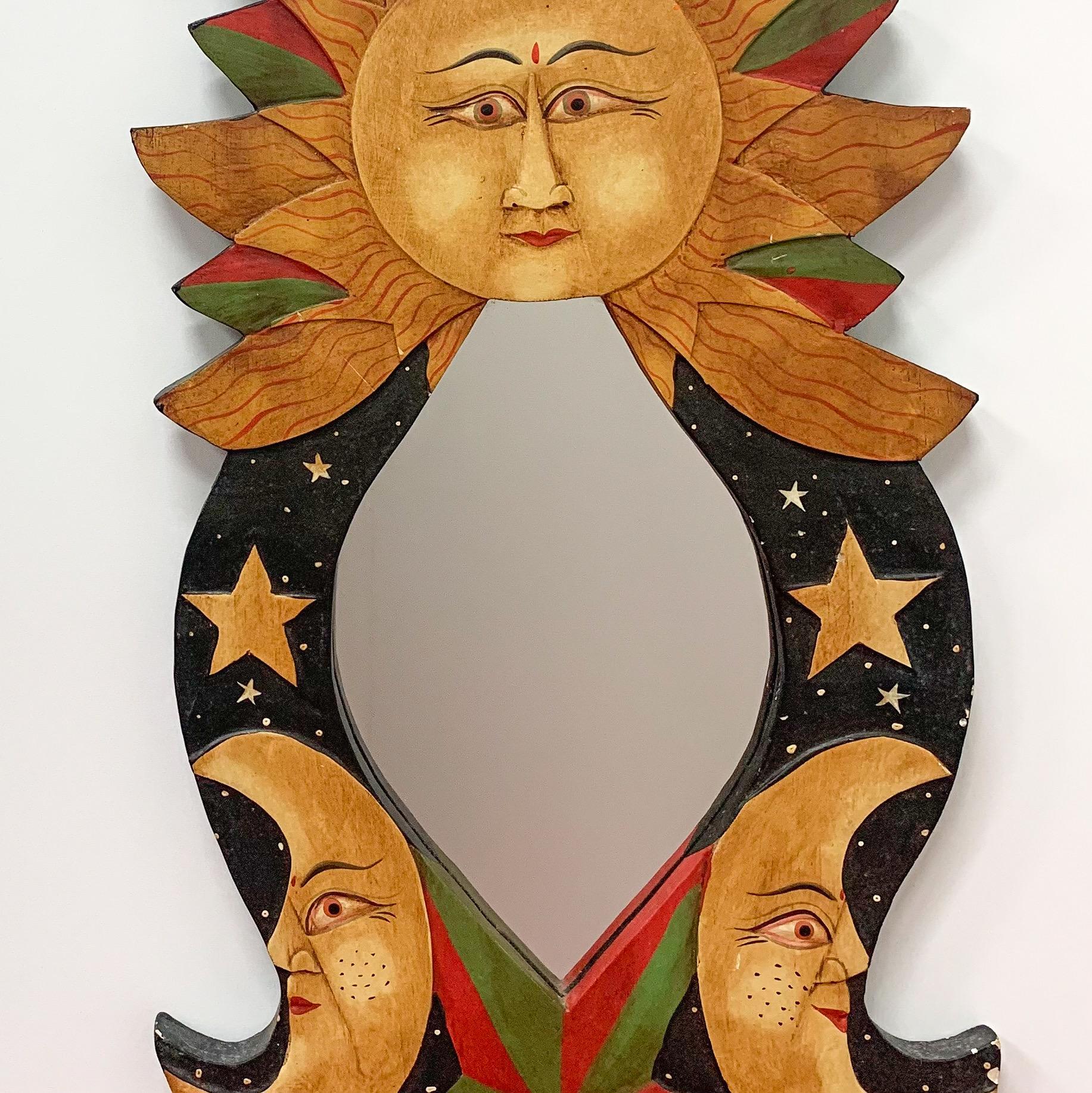 Vintage sun, moon and star mirror with painted frame - Indonesian, c1990s.