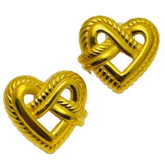 Vintage SUNG signierte goldene Herz-Designer-Ohrringe