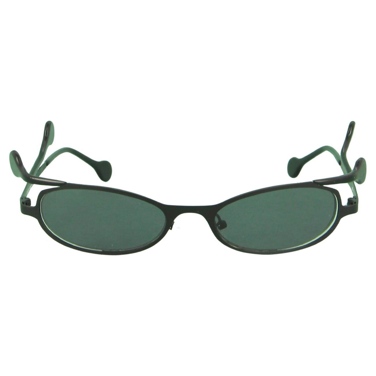 Vintage sunglasses from the 90
s, crazy shape, made in France