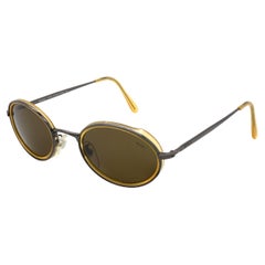 Vintage sunglasses by Lozza made in Italy. Oval 80s sunglasses