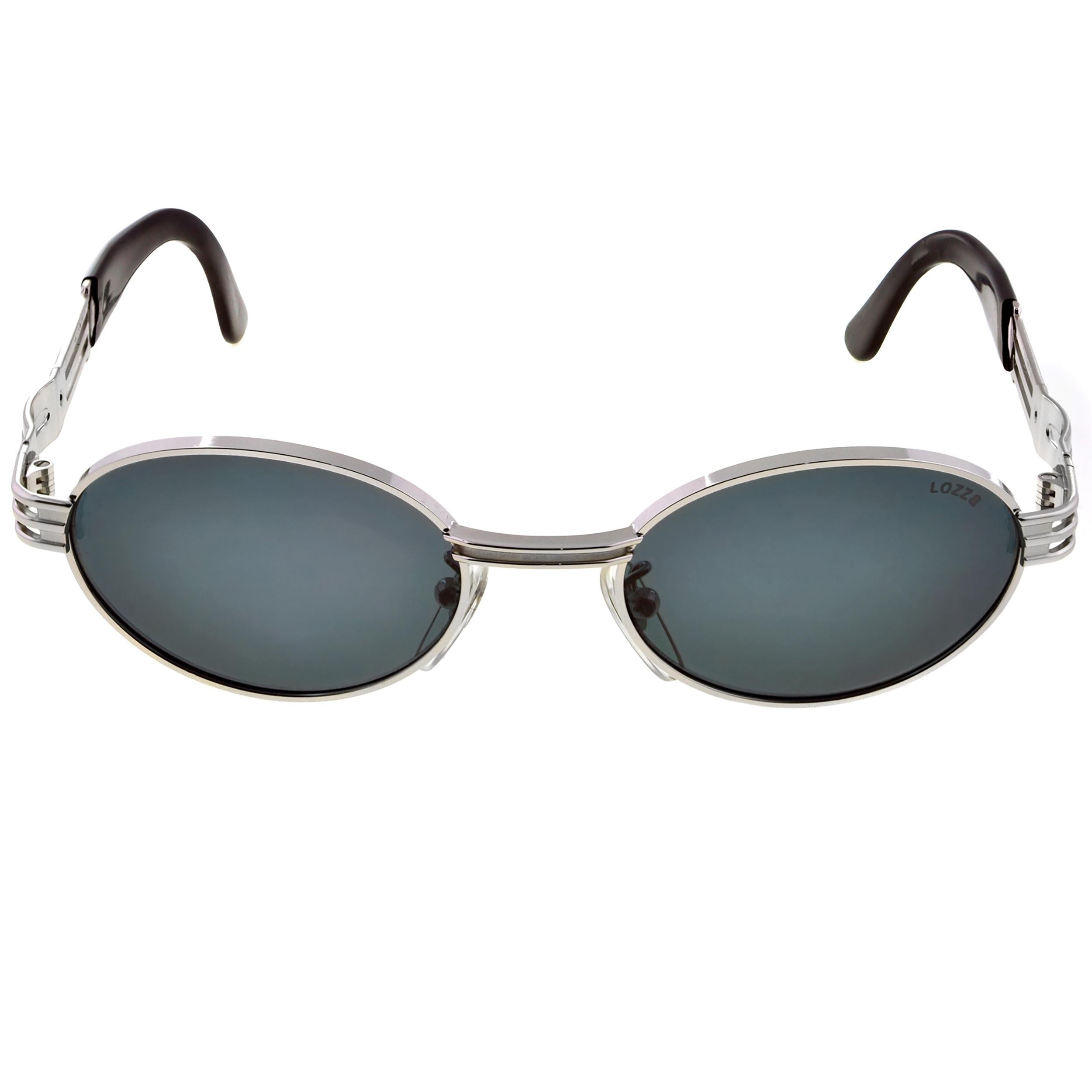 Vintage sunglasses made by Lozza in Italy.  Oval 80s sunglasses [never worn] In New Condition For Sale In Santa Clarita, CA