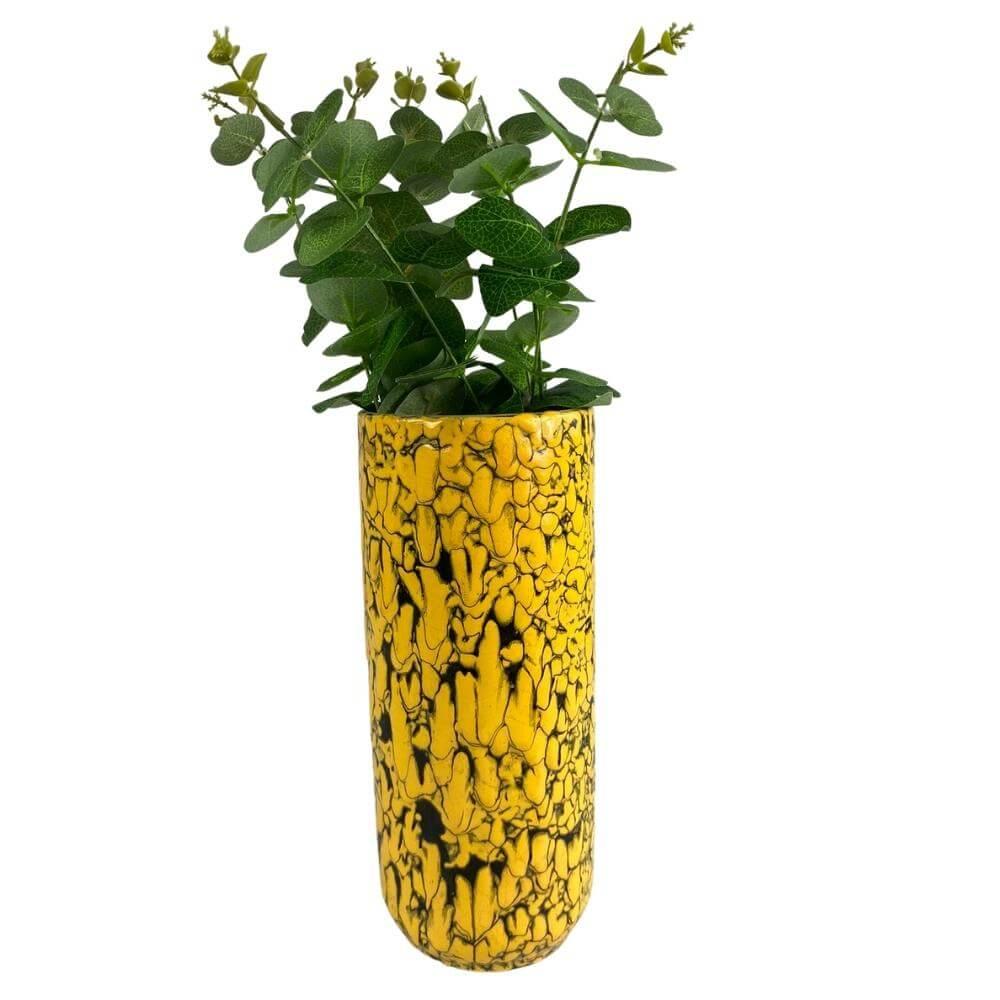 A vase with a bright sunny yellow-black dripped glaze from the 1960s-1970s period. Inside with black glaze. A wild, characterful piece that fills the space with life with pink flowers. 
This technique was used from the 1950s, it had a very modernist