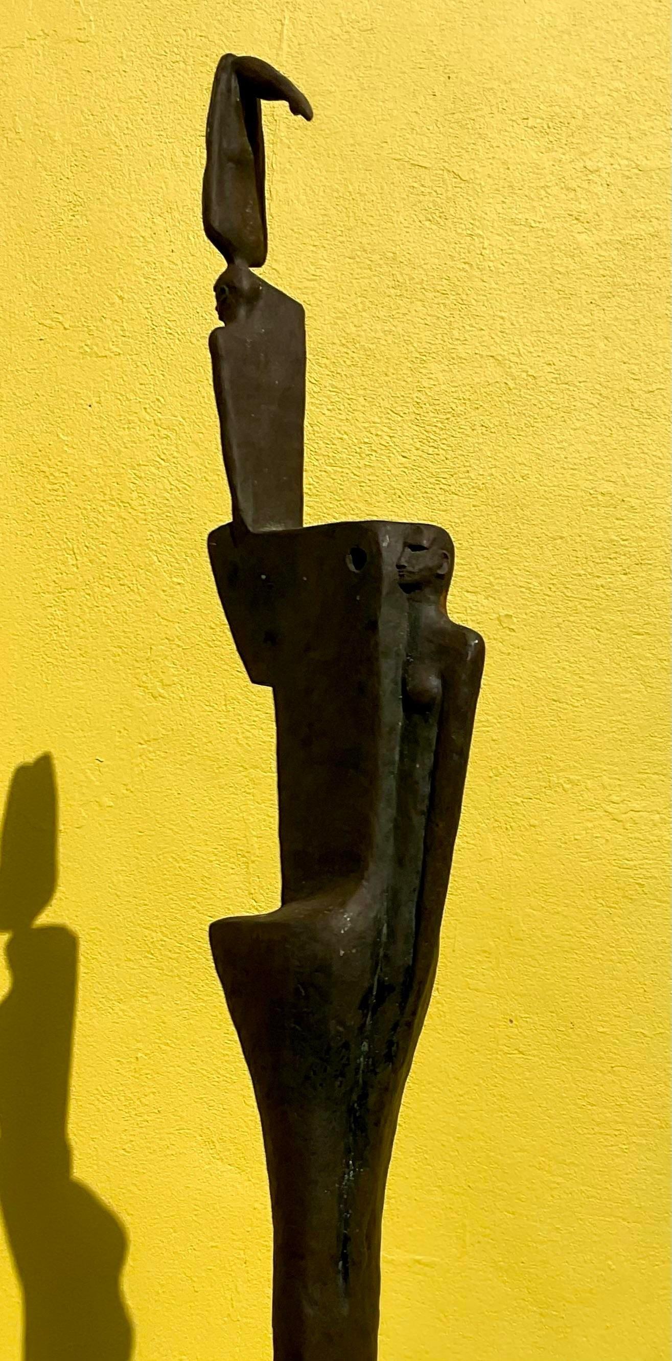 A fantastic vintage Boho sculpture. A chic Abstract Surrealist work in a beautiful patinated bronze. Done by the American artist Thom Cooney Crawford. Acquired from a Palm Beach estate. 