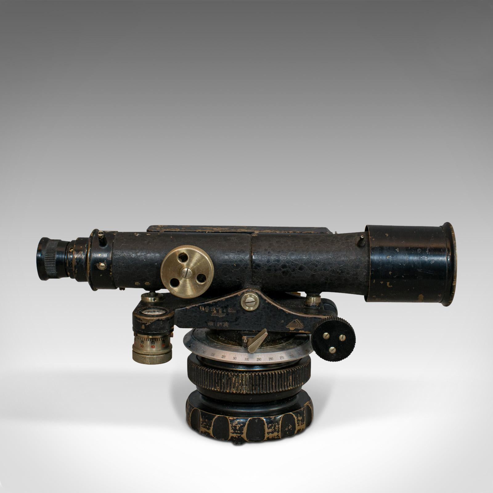 This is a vintage surveyor's level. An English, brass and alloy theodolite, perfect as desk ornament by E.R. Watts of London, dating to the mid-20th century, circa 1940.

Charming, vintage scientific instrument, pleasingly heavy at 2.75kg (6.06