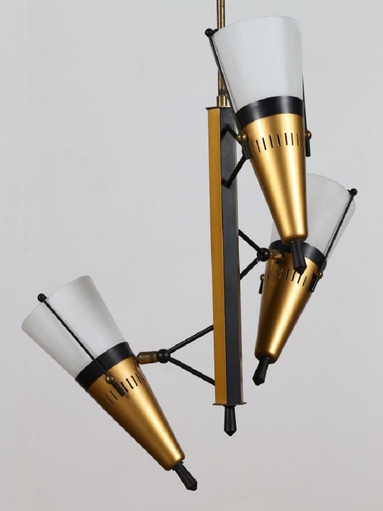 Vintage suspended lamp is a design lamp manufactured in Italy, circa 1950s.

Elegant suspended three-lights lamp in lacquered metal, brass and glass. 

Dimensions: cm 40 x 90 x 40.

In very good conditions.

This object is shipped from Italy. Under